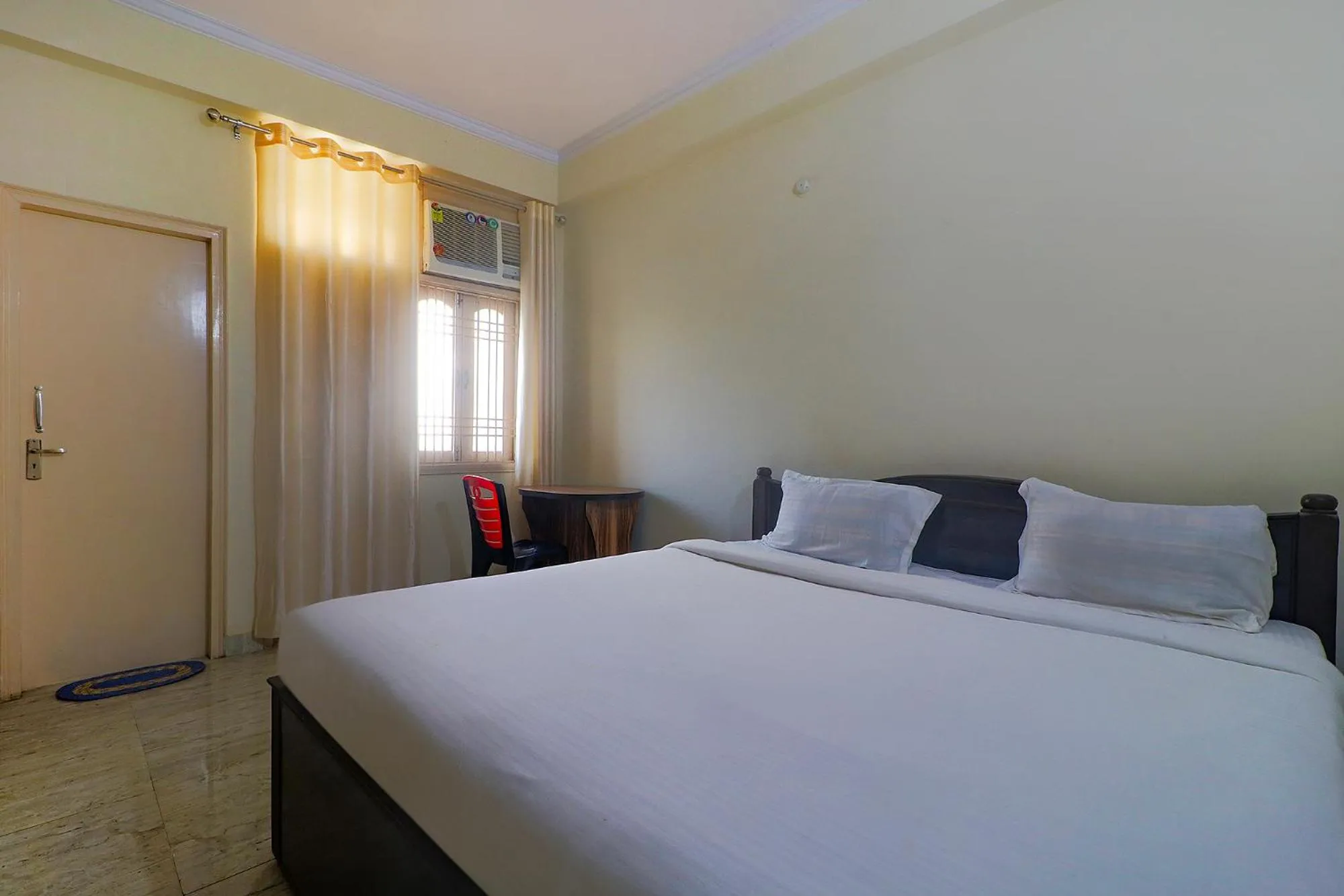 Bed in FabHotel Buddha Residency