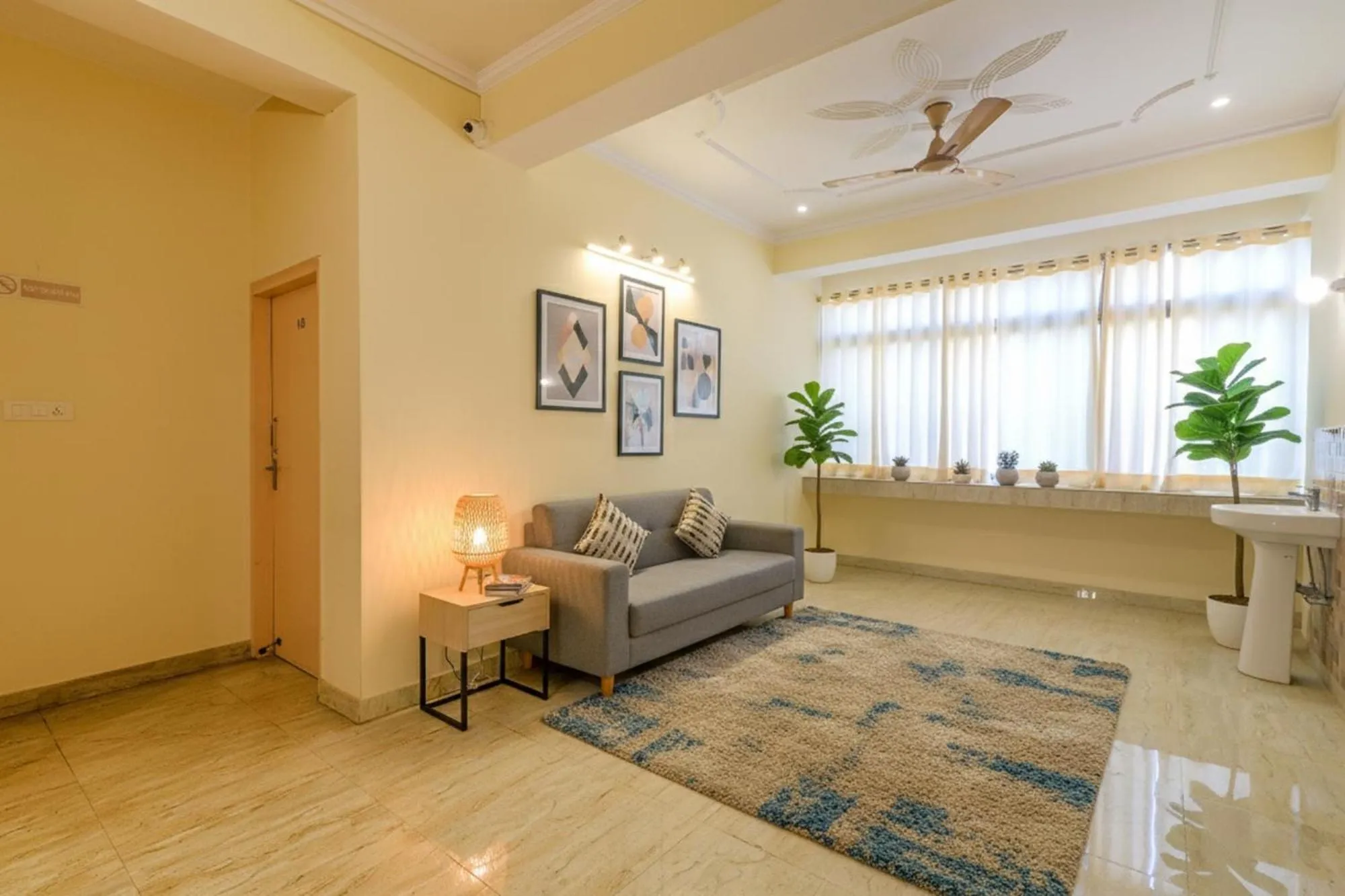 Seating area in FabHotel Buddha Residency