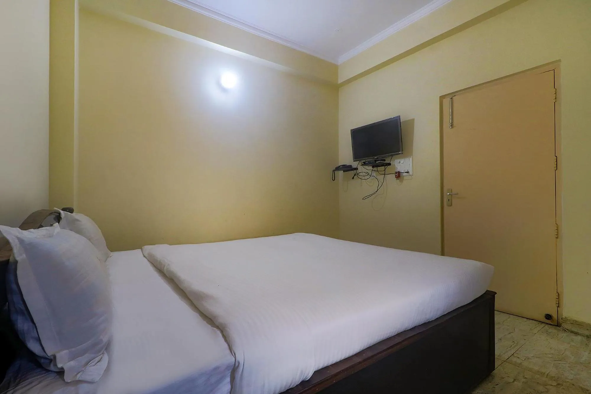 Bed in FabHotel Buddha Residency