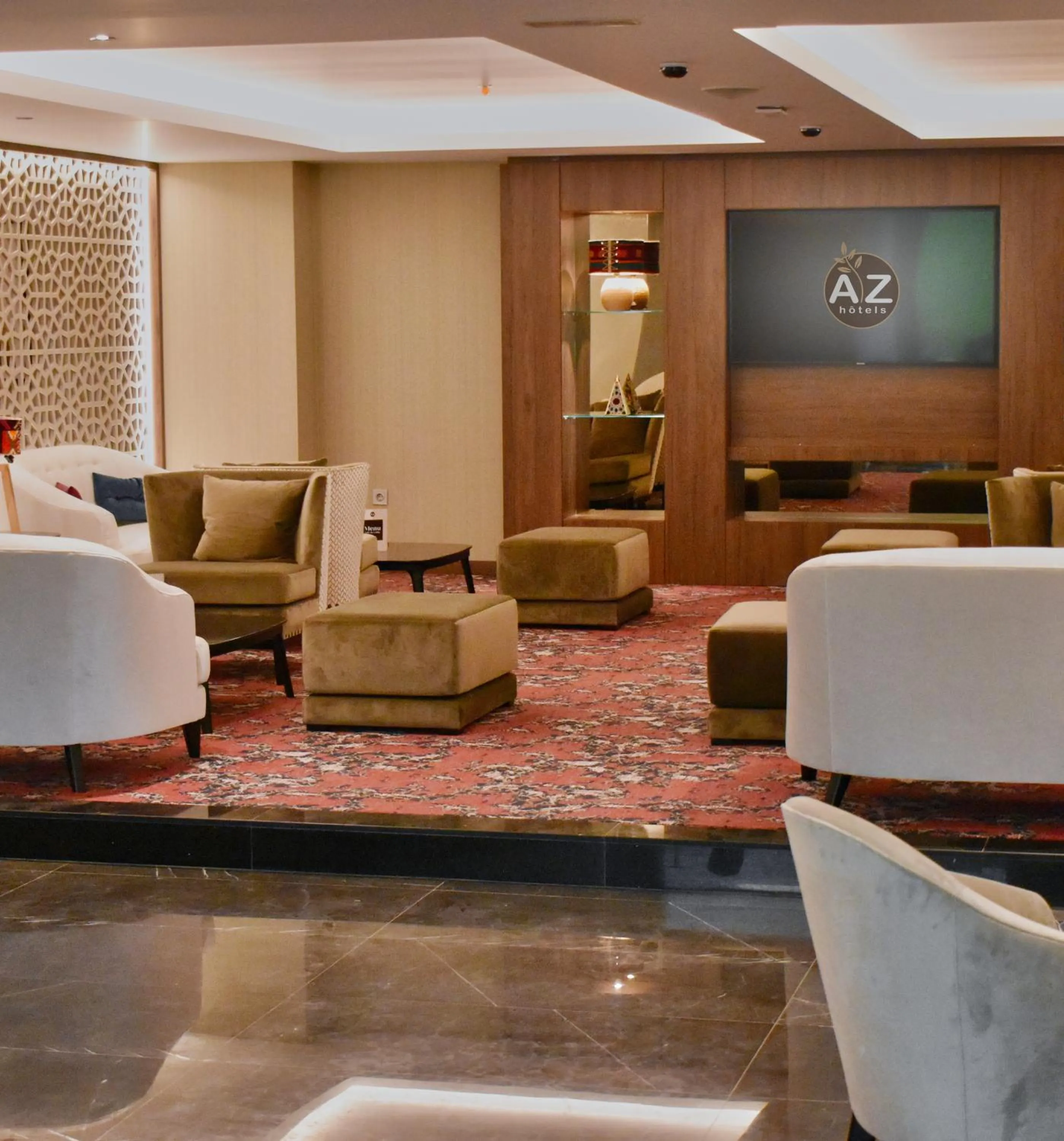 Communal lounge/ TV room in AZ Hotels Grand Oran