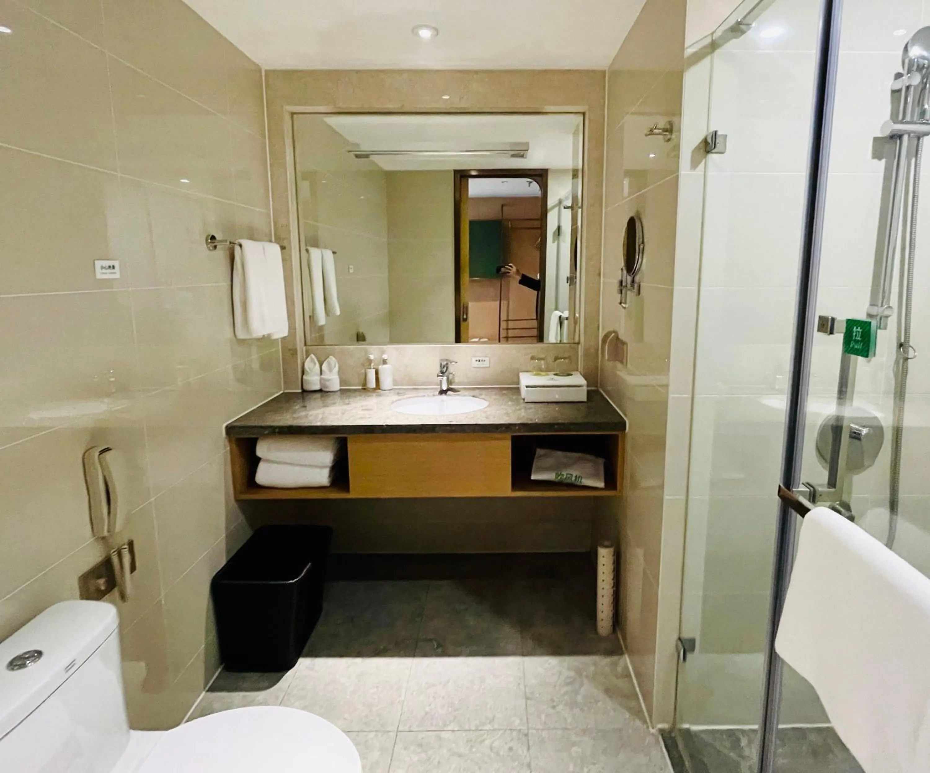 Toilet in Holiday Inn Chongqing Guanyinqiao, an IHG Hotel