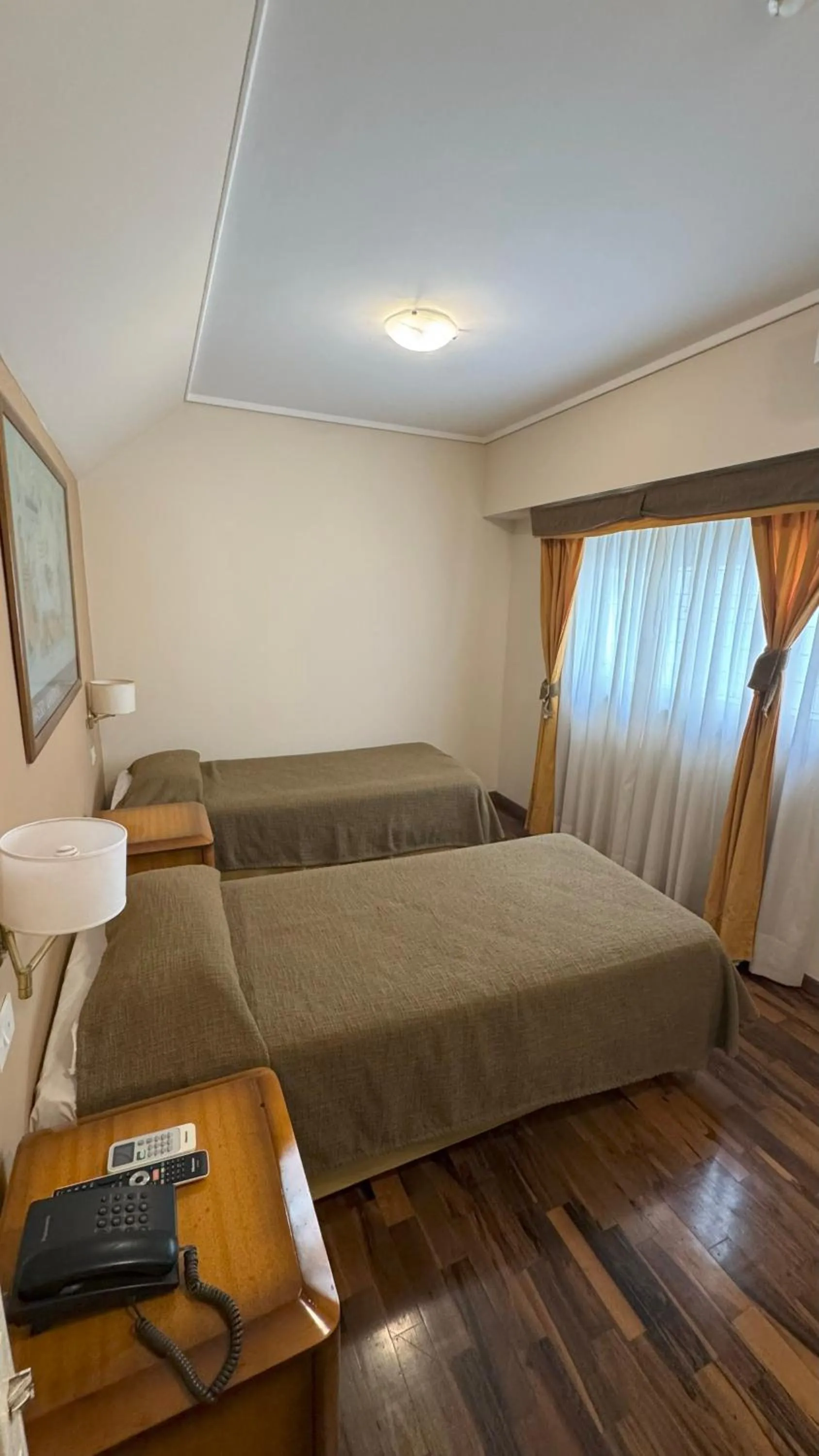 Photo of the whole room, Bed in Tritone Hotel