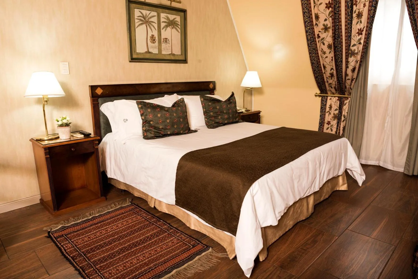 Bed in Mayflower Suites