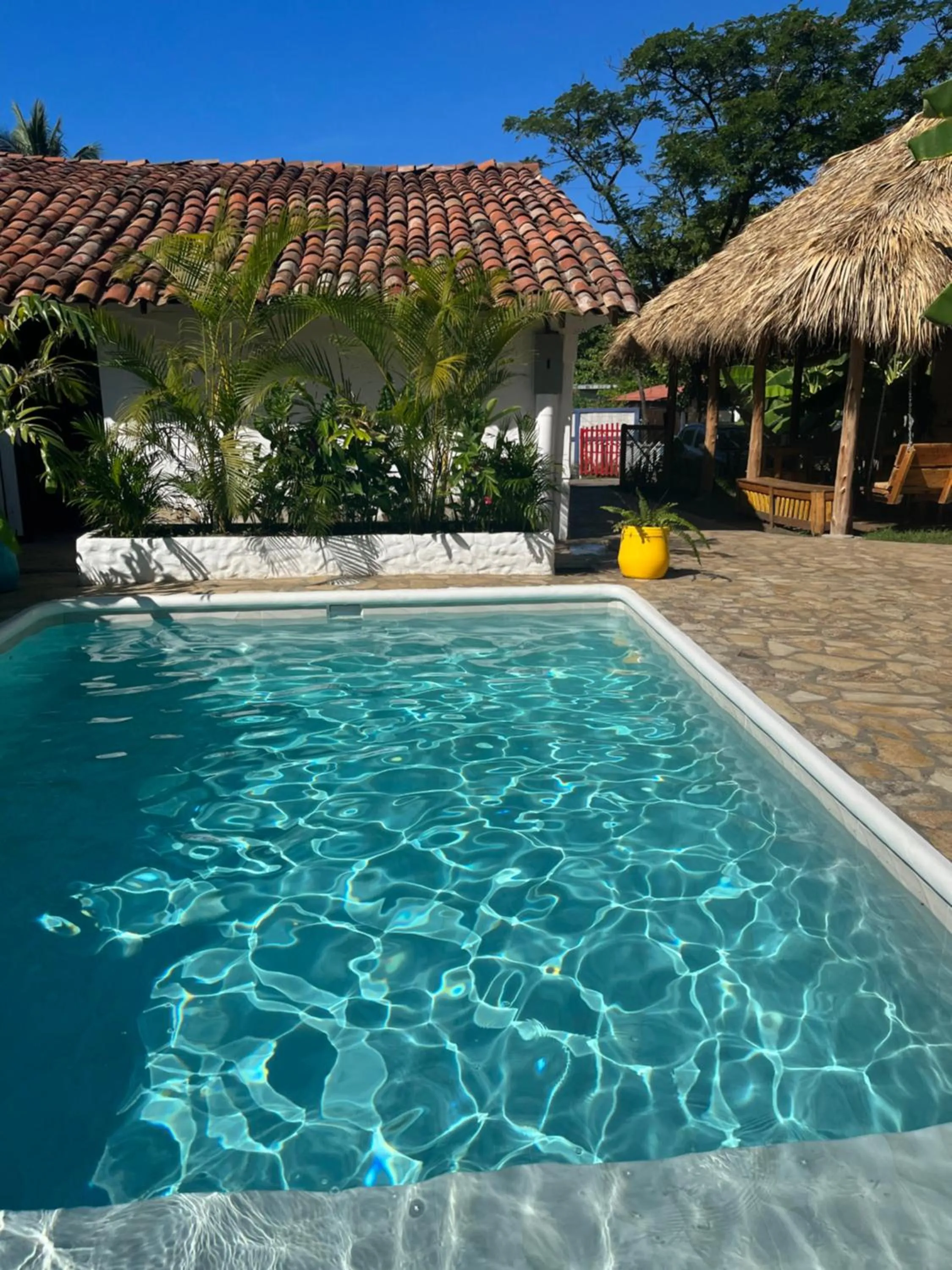 Swimming pool in Hotel Cabañas Puesta del Sol