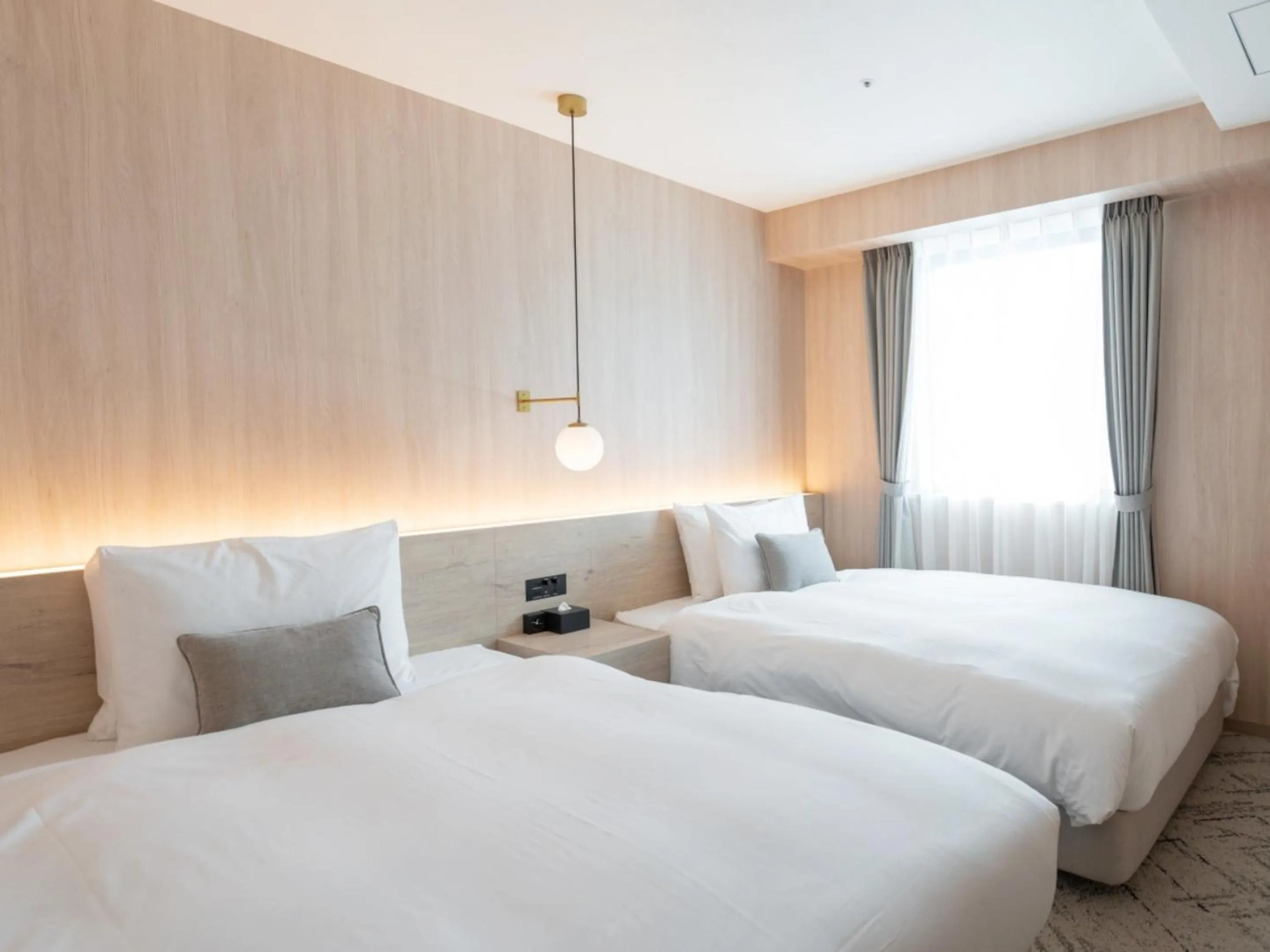 Bed in HOTEL THE LEBEN OSAKA