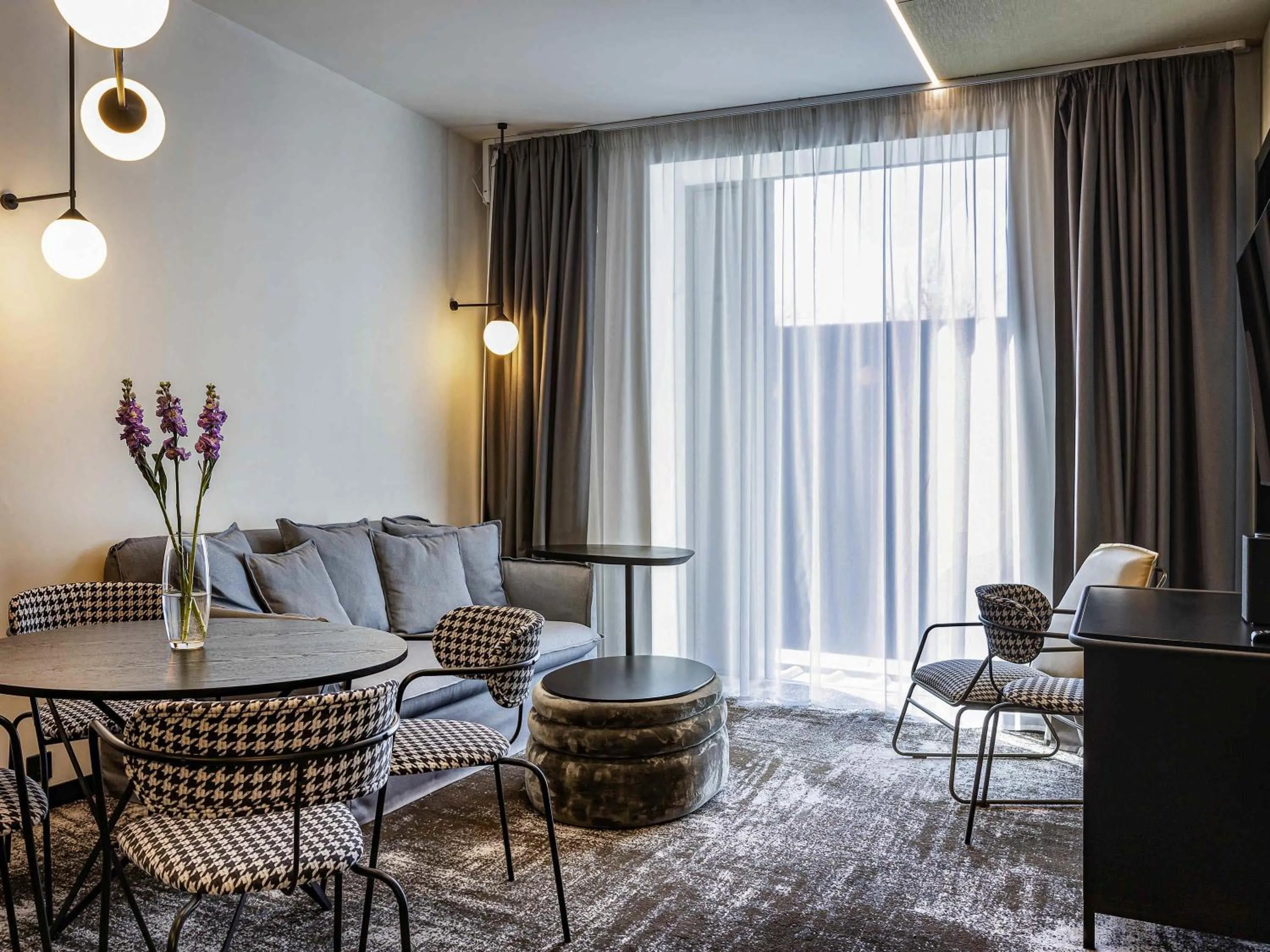 Bedroom in Novotel Living Almaty Jetisu