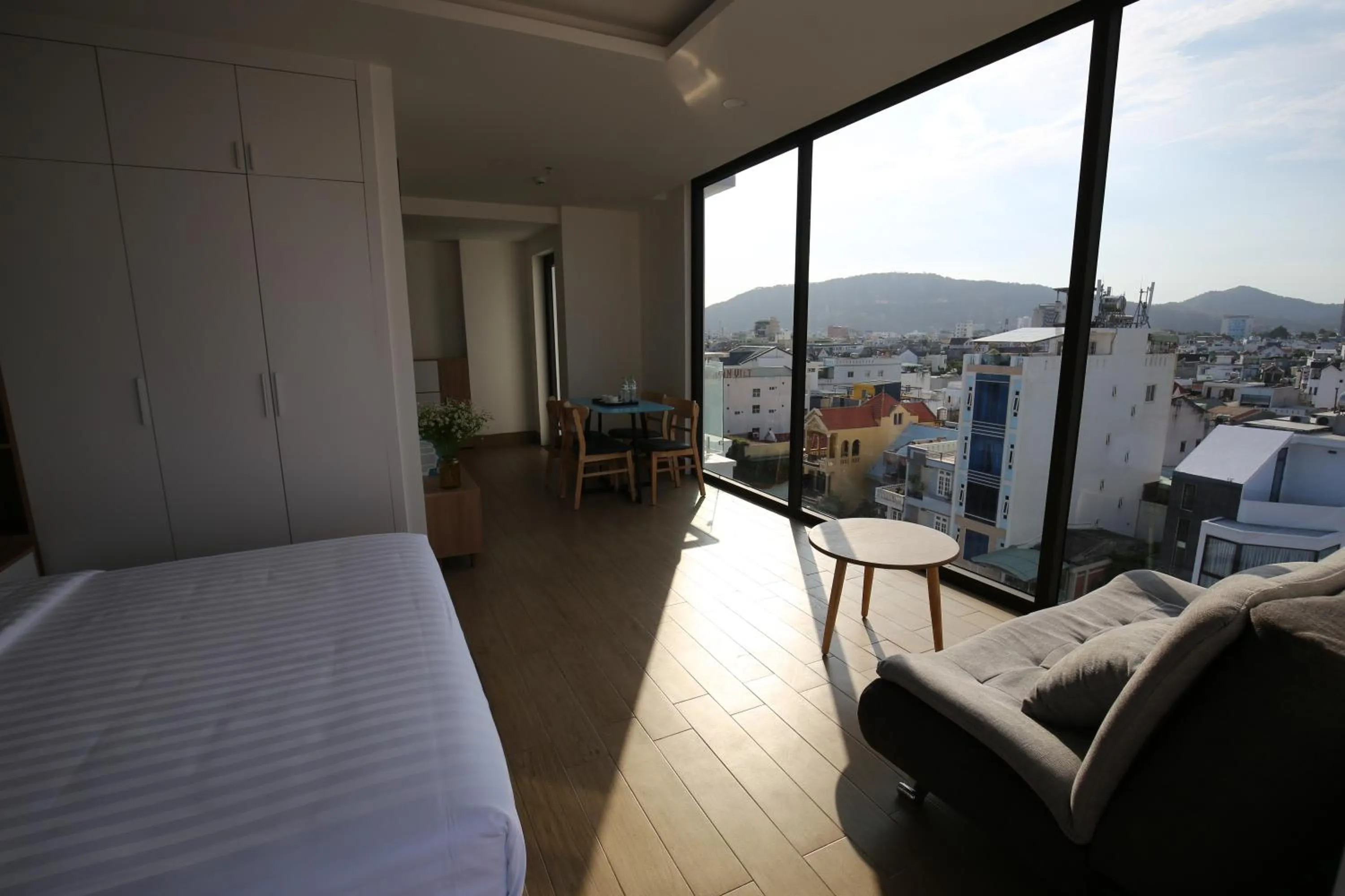 Living room, Bed in TDMAISON Hotel & Apartment