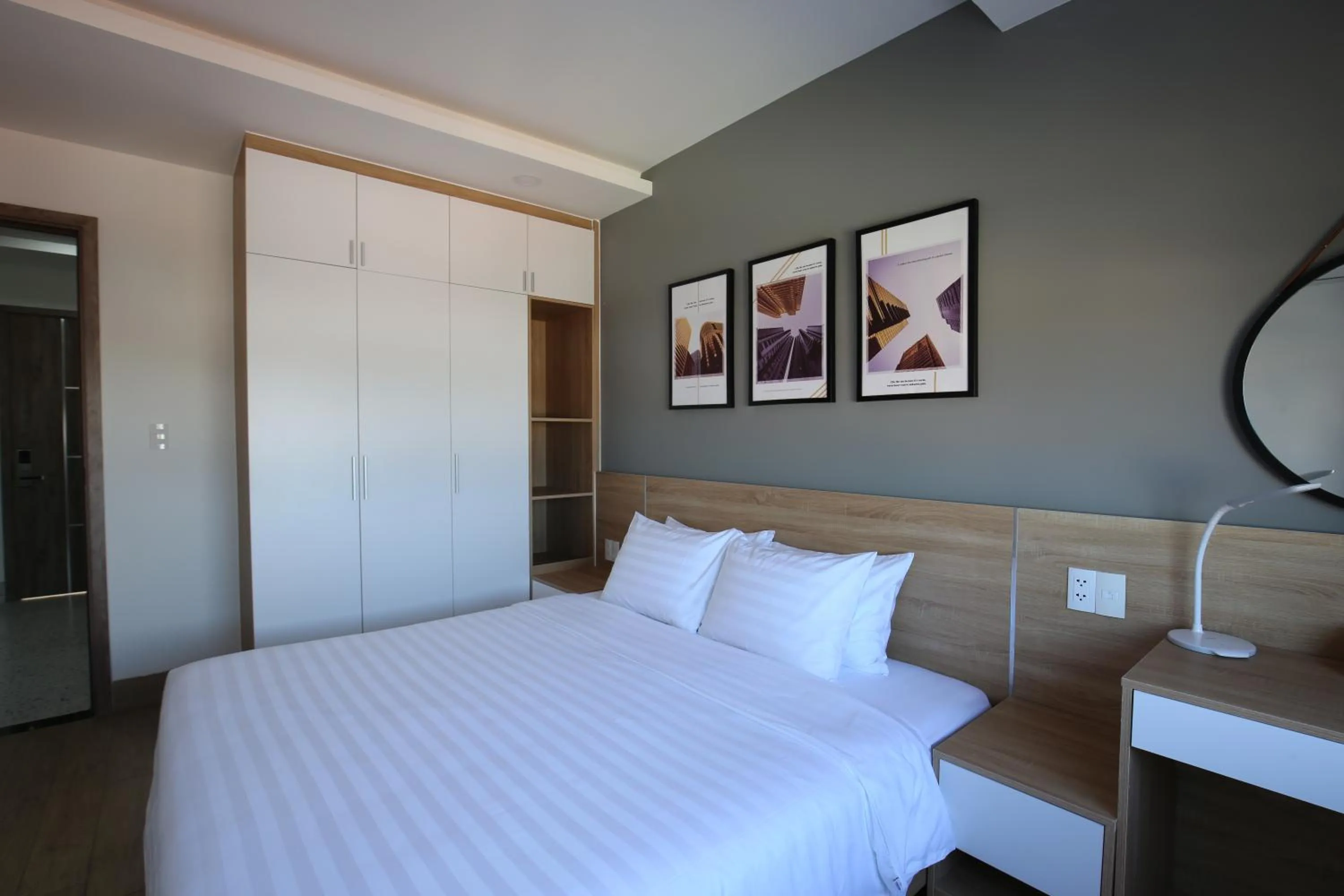 Bed in TDMAISON Hotel & Apartment