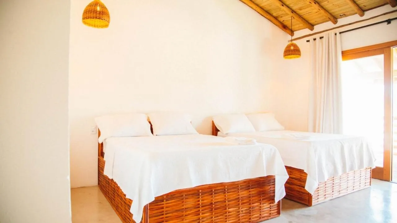 Bed in Pousada Vila Mangaba