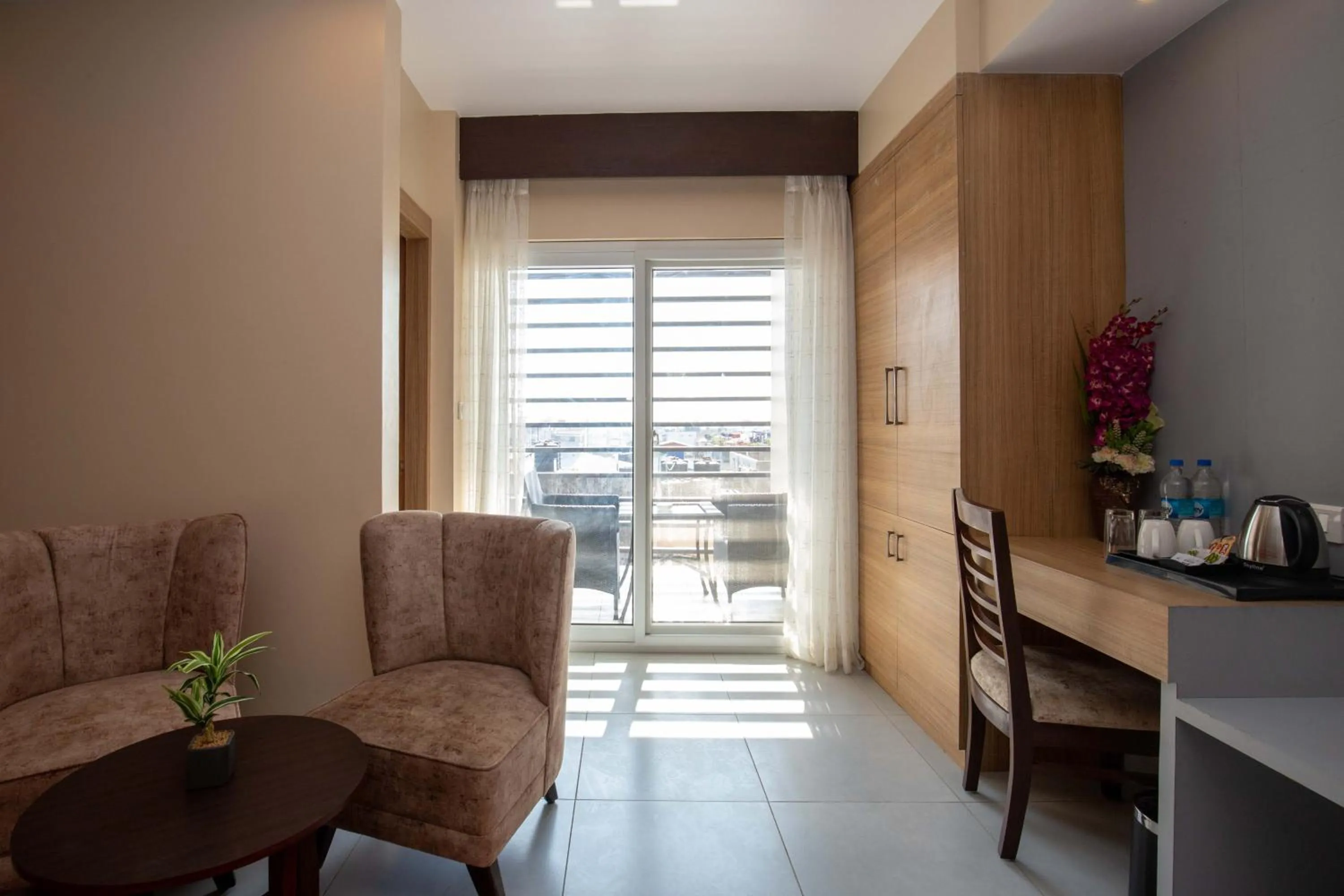 Seating area in Hotel Palm International