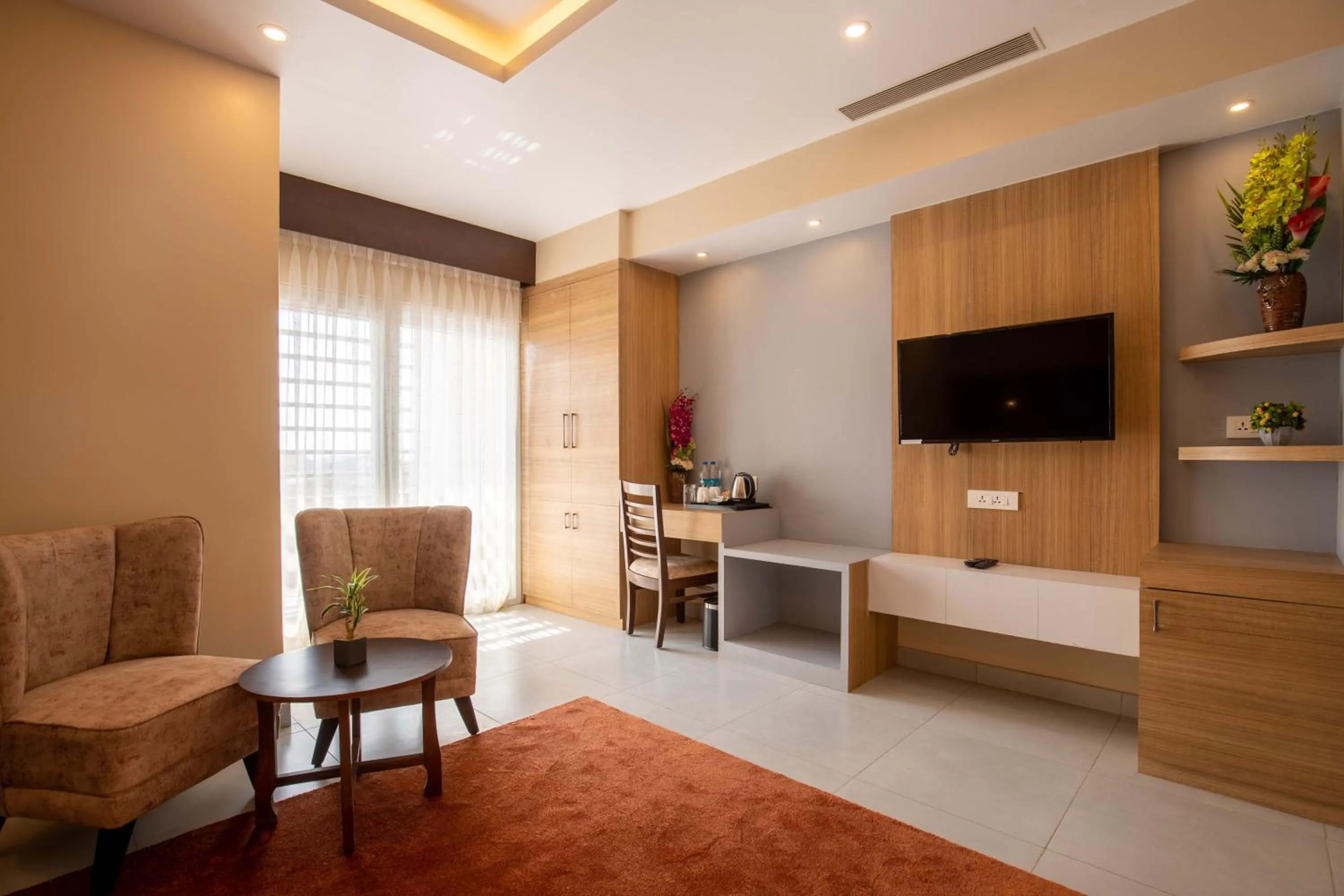 Communal lounge/ TV room in Hotel Palm International