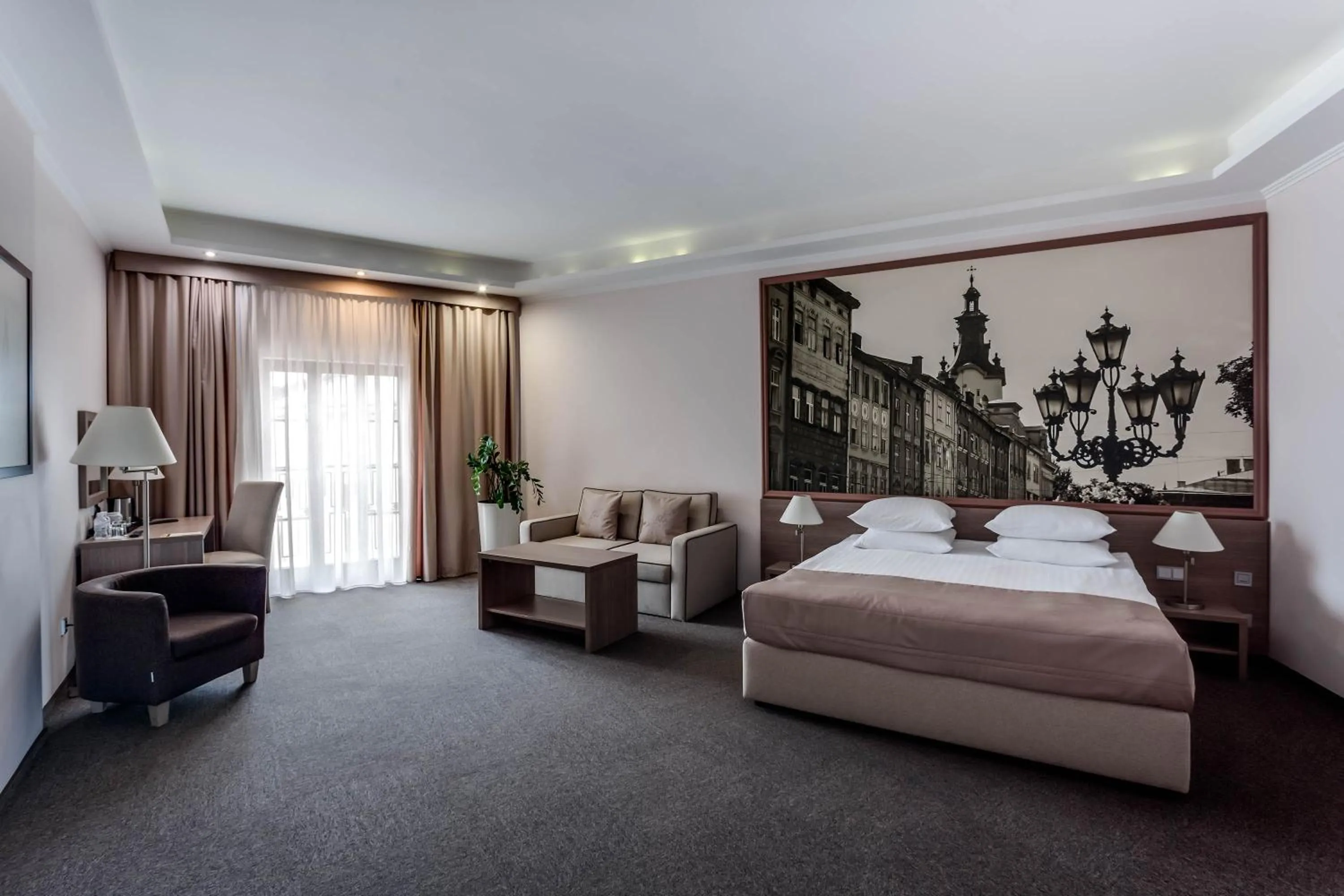 Photo of the whole room, Bed in Rius Hotel Lviv