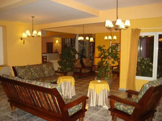 Communal lounge/ TV room in Kelta Hotel El Calafate