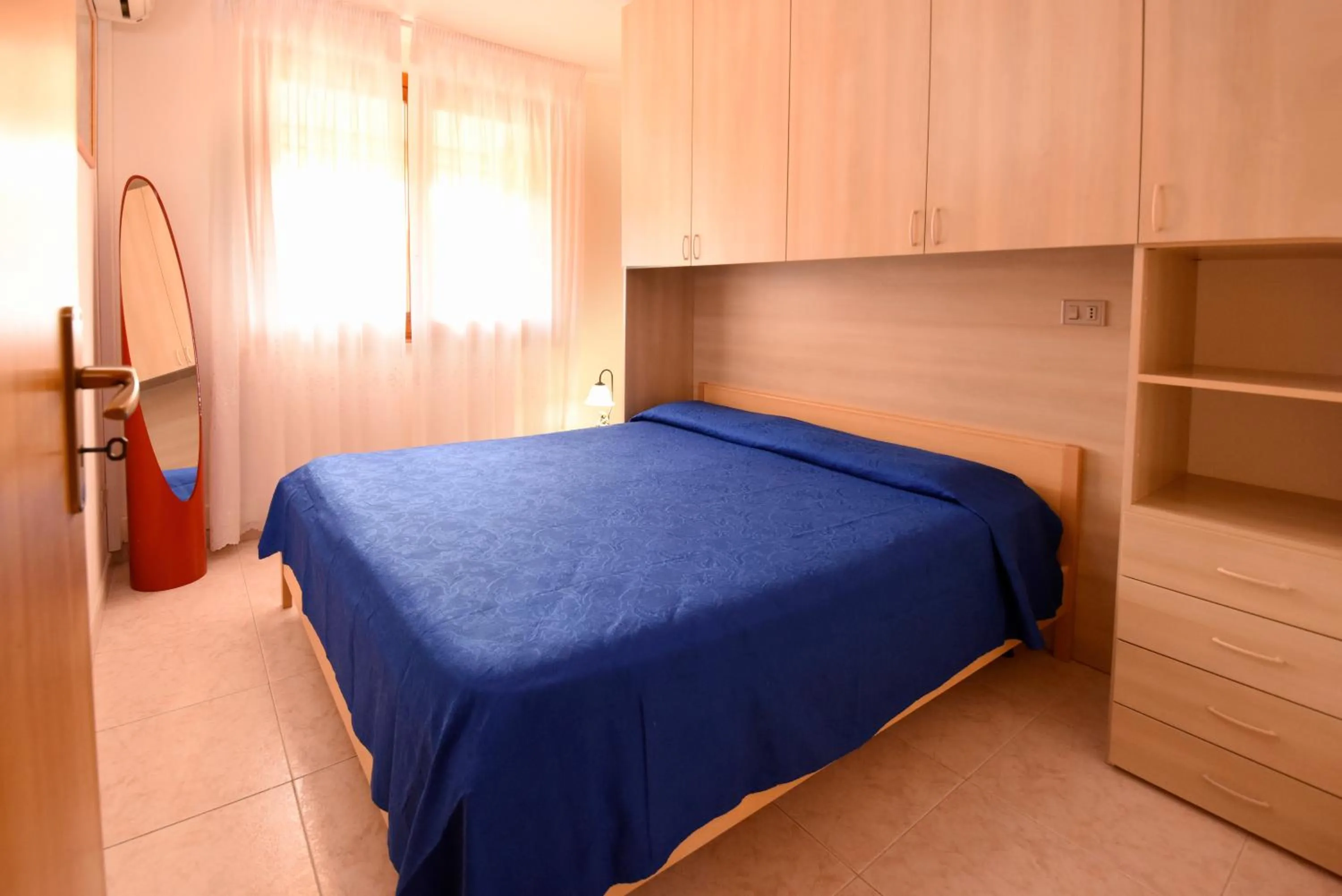 Bed in Residenza Le Due Palme