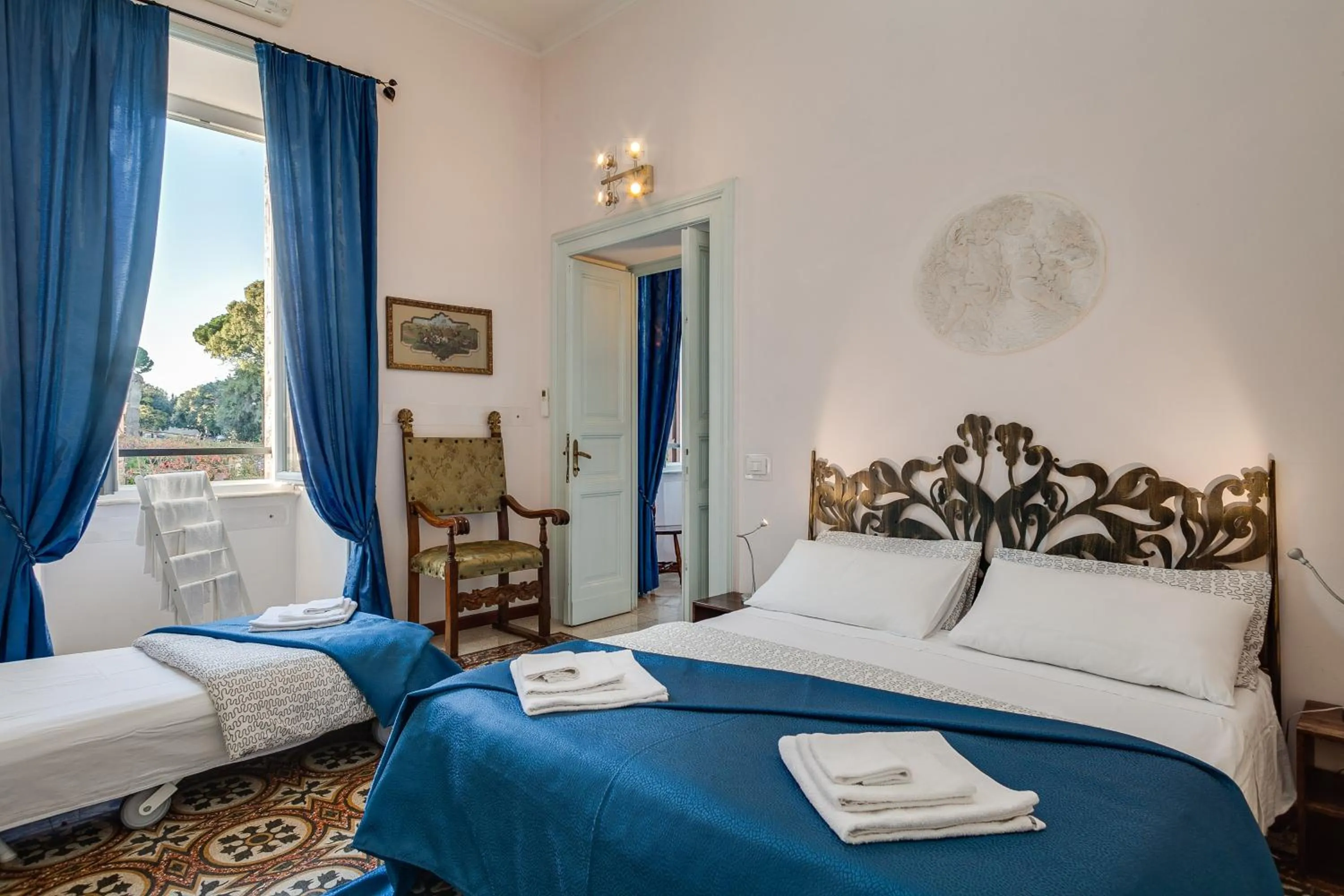 Bed in Otium Maecenatis Apartments