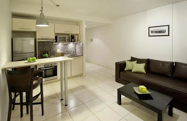 Kitchen or kitchenette in Piccaluga Apartments