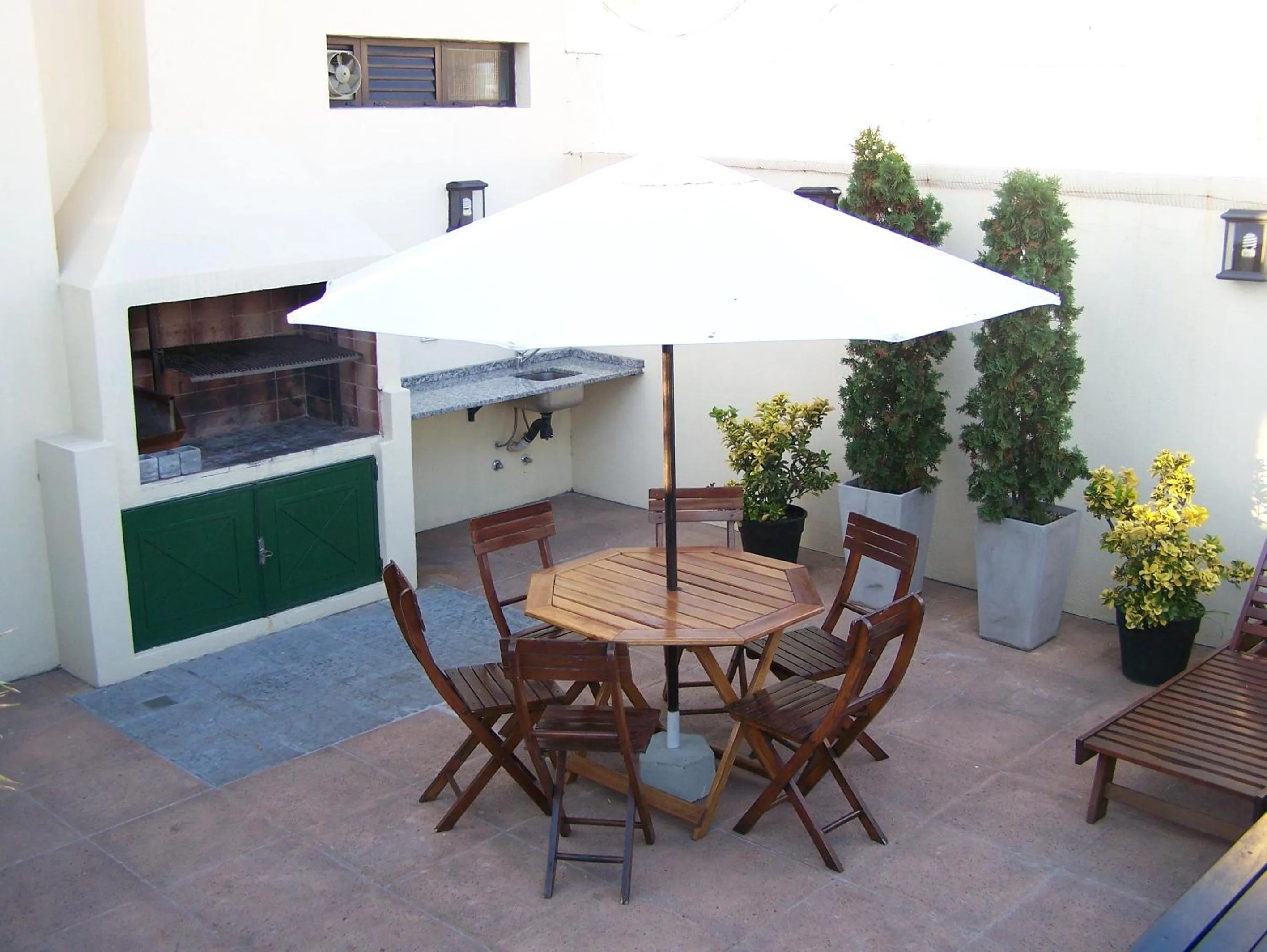 BBQ facilities in Piccaluga Apartments