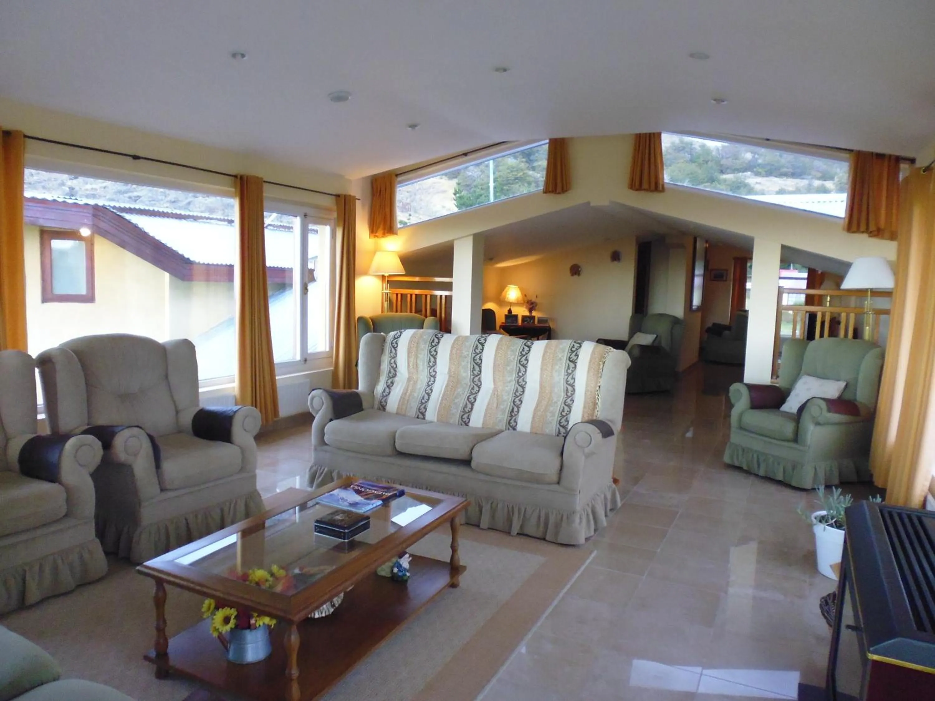 Communal lounge/ TV room in Estancia La Quinta