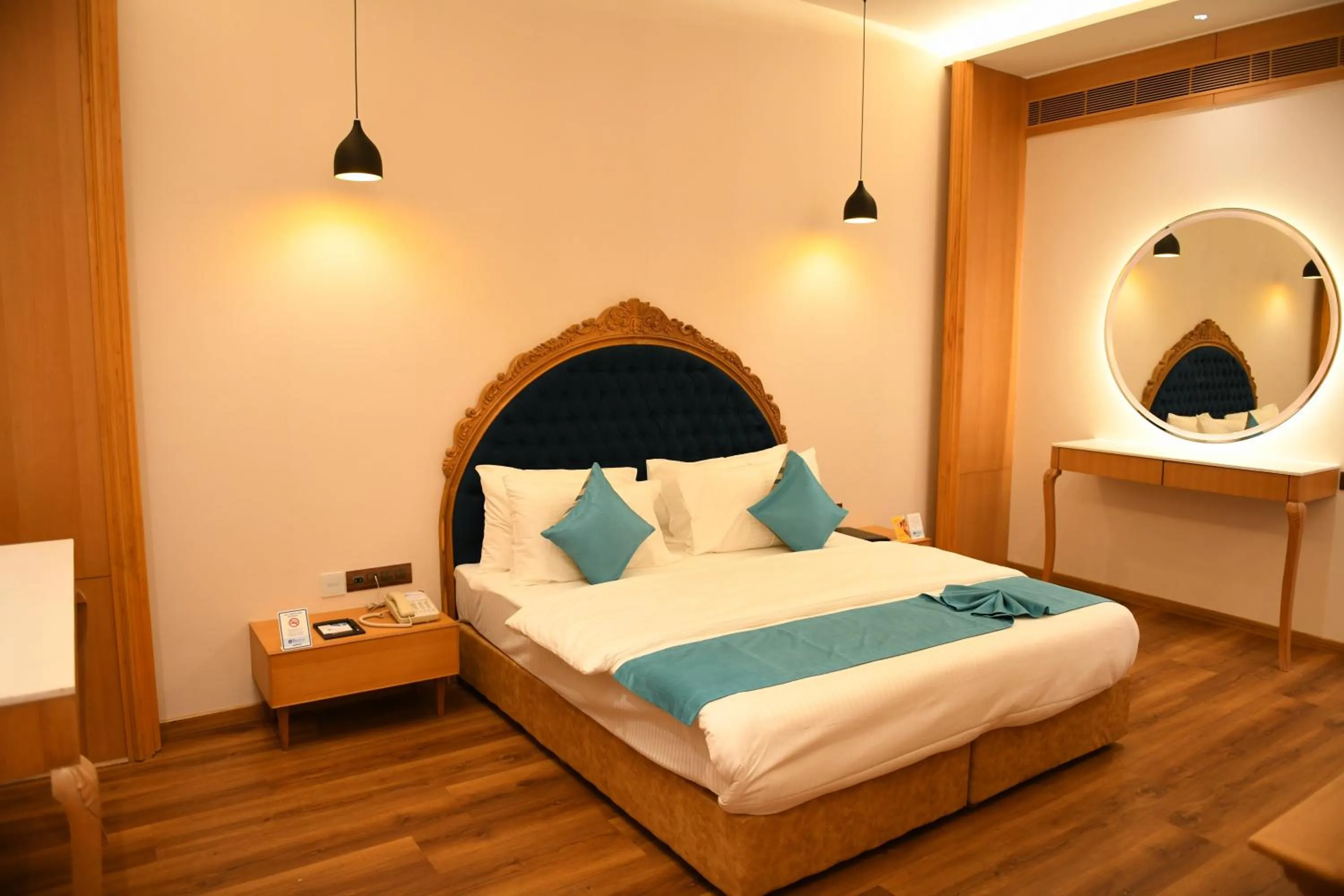 Photo of the whole room, Bed in Hotel Blueivy Anand