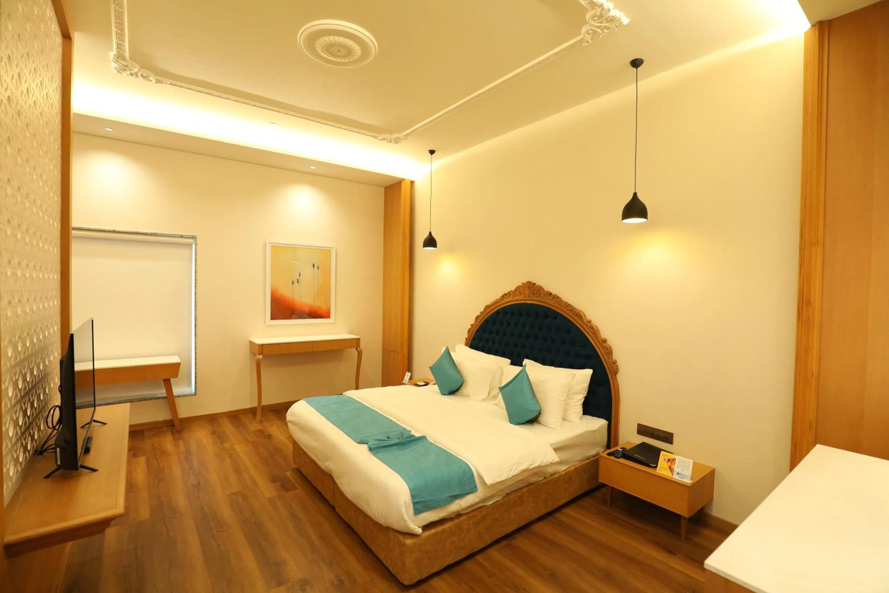 Bed in Hotel Blueivy Anand