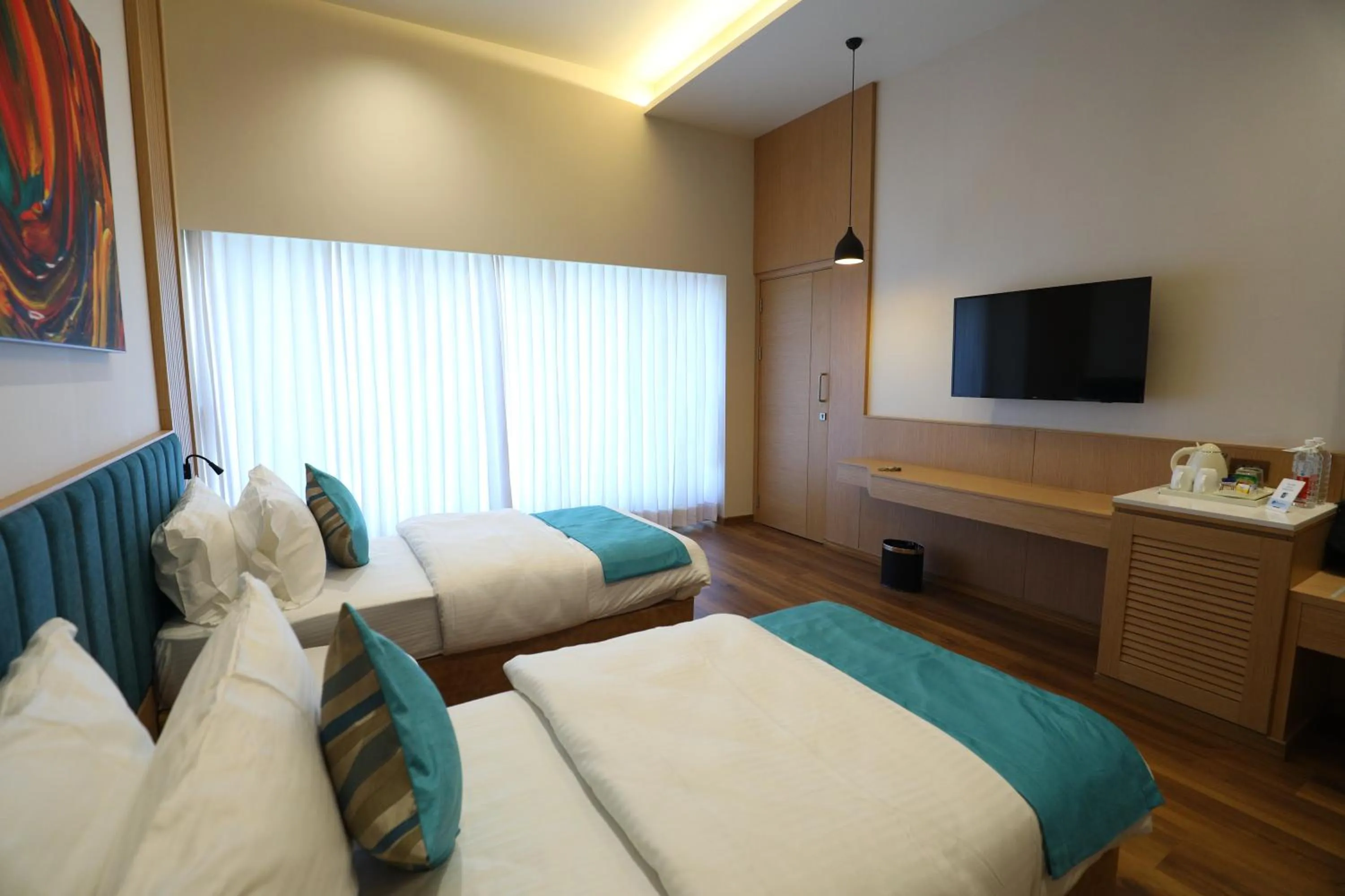 Photo of the whole room, Bed in Hotel Blueivy Anand