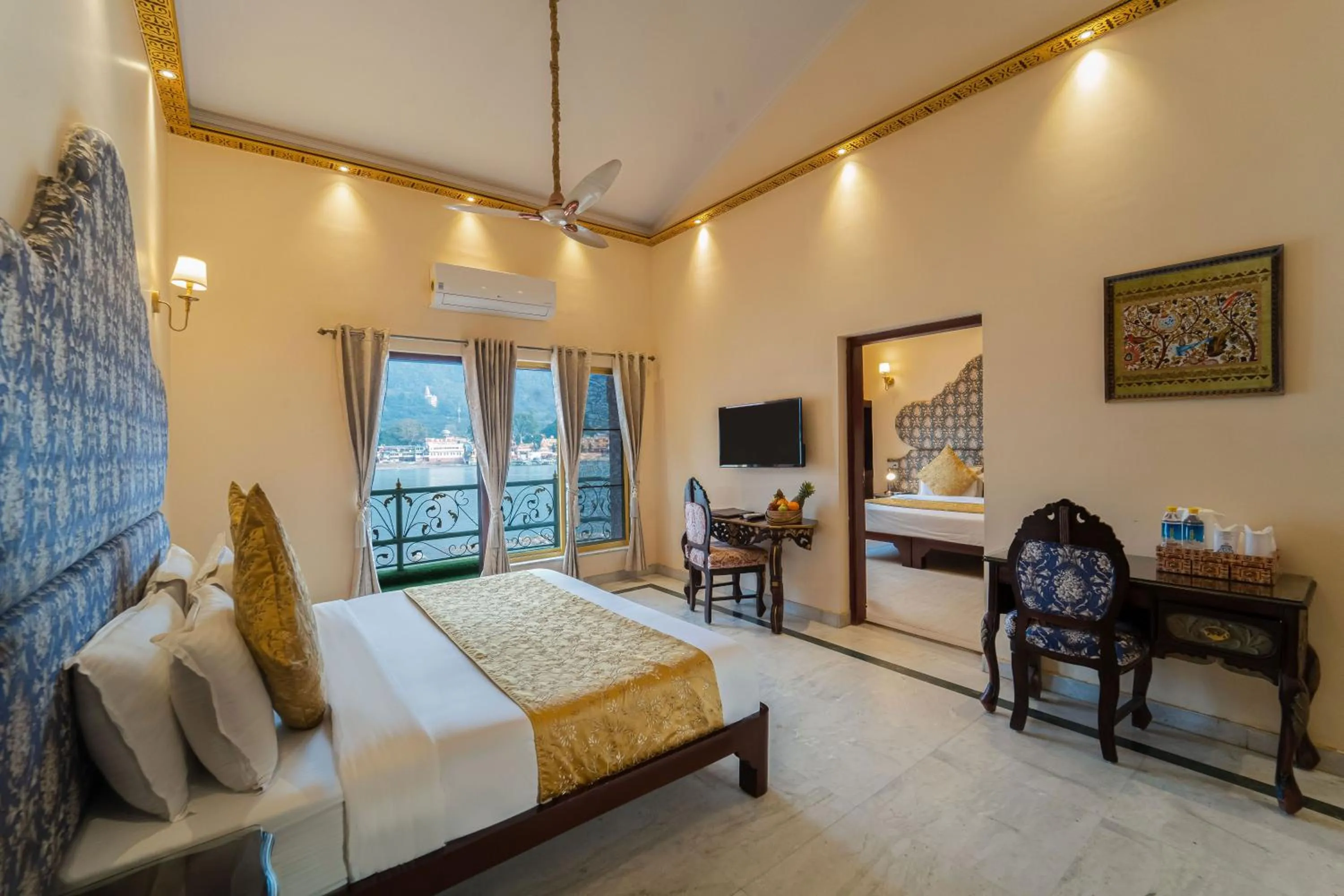 Photo of the whole room, Bed in The Neeraj Ganga Heritage Palace