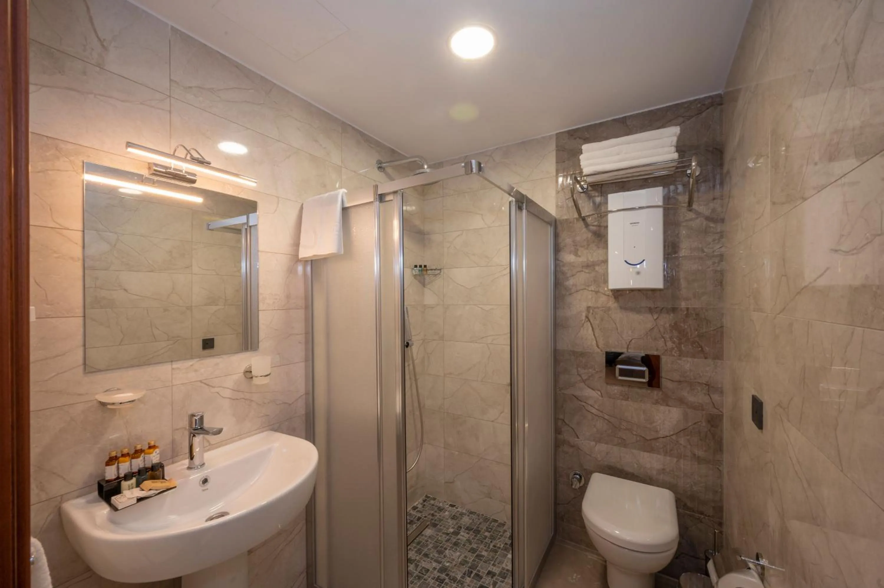 Bathroom in KA Hotel & Suites