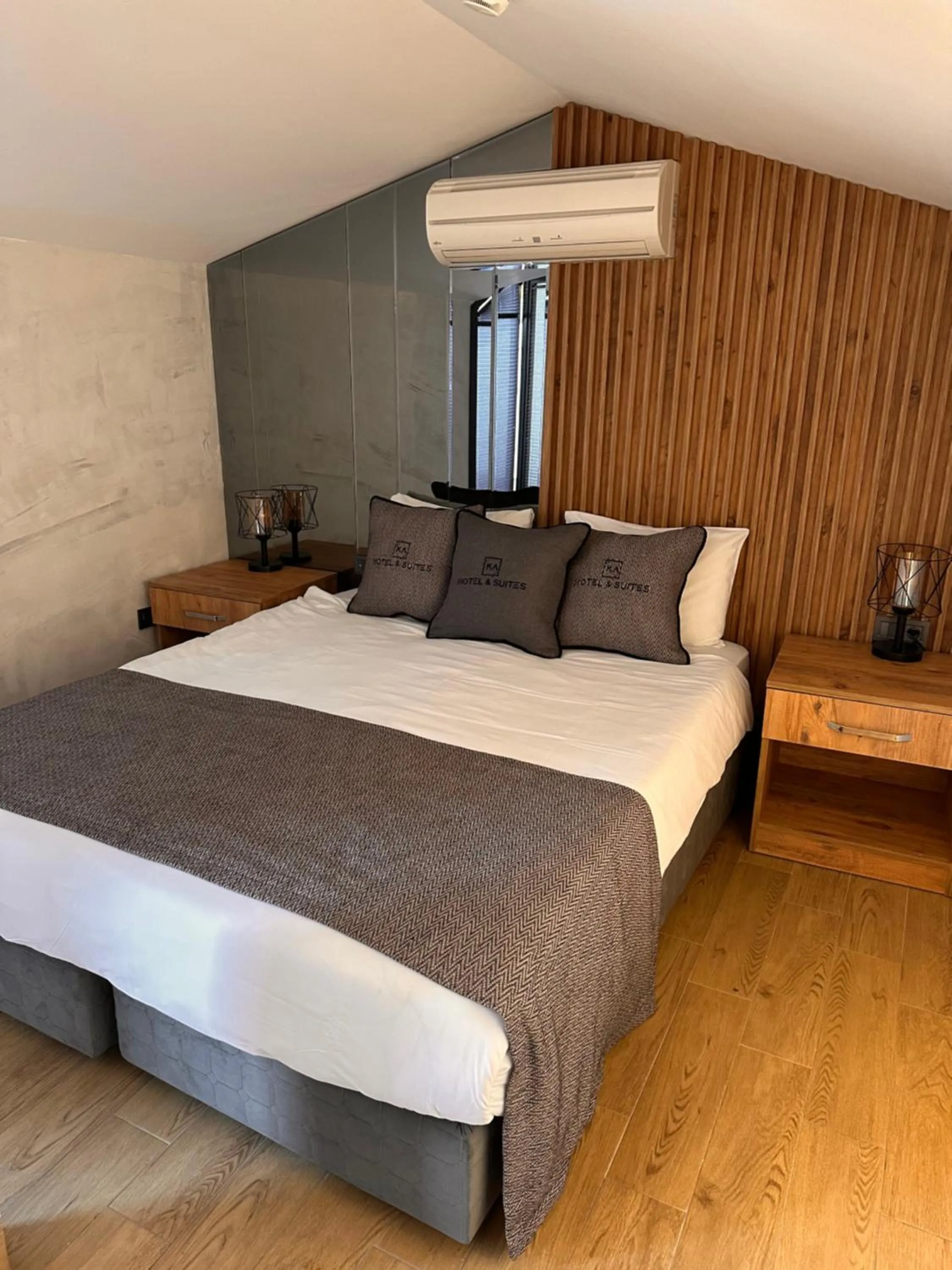 Bed in KA Hotel & Suites