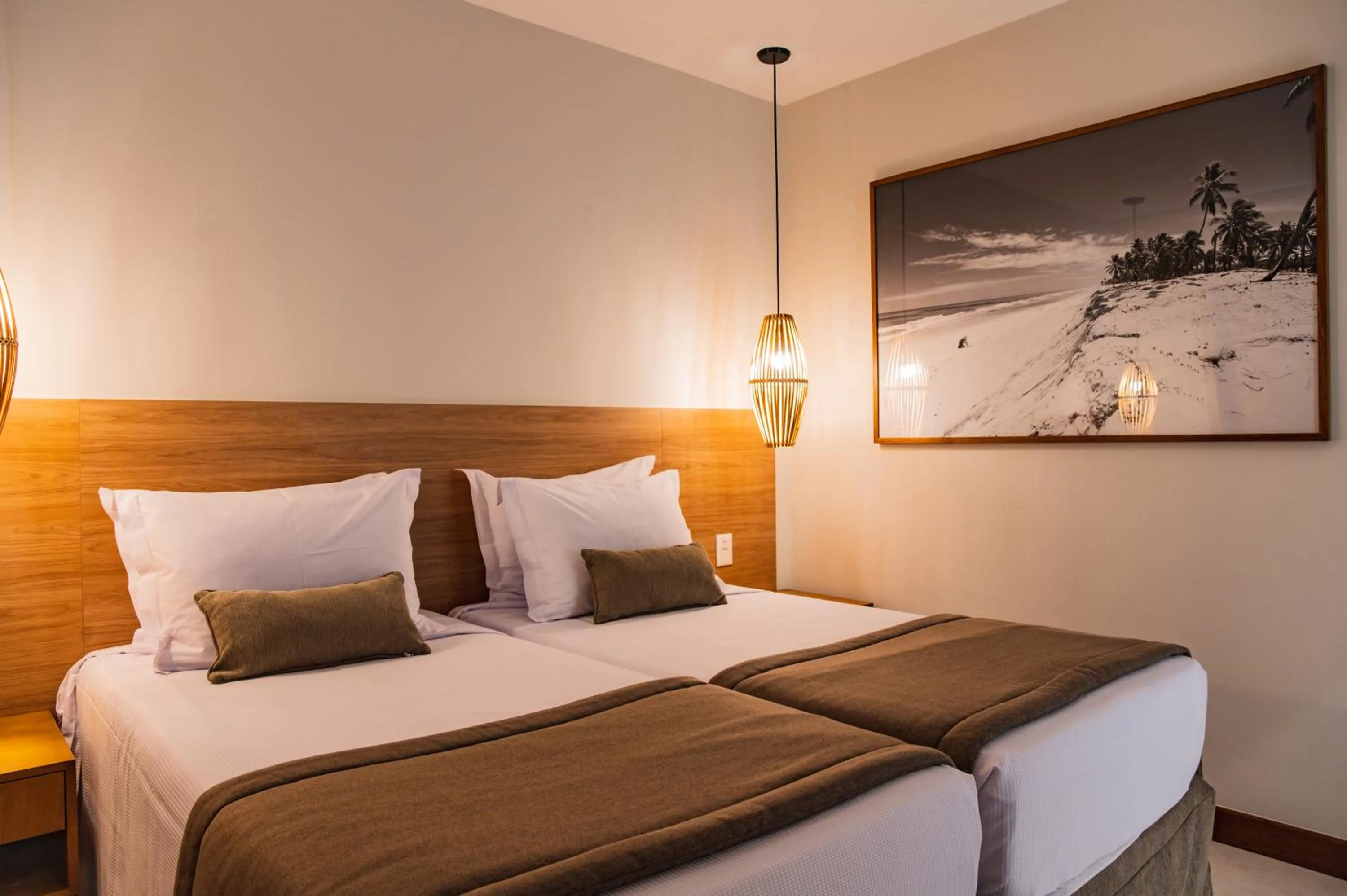 Bed in Hotel Boutique & Spa Ponta de Inhambupe by Slaviero Hotéis