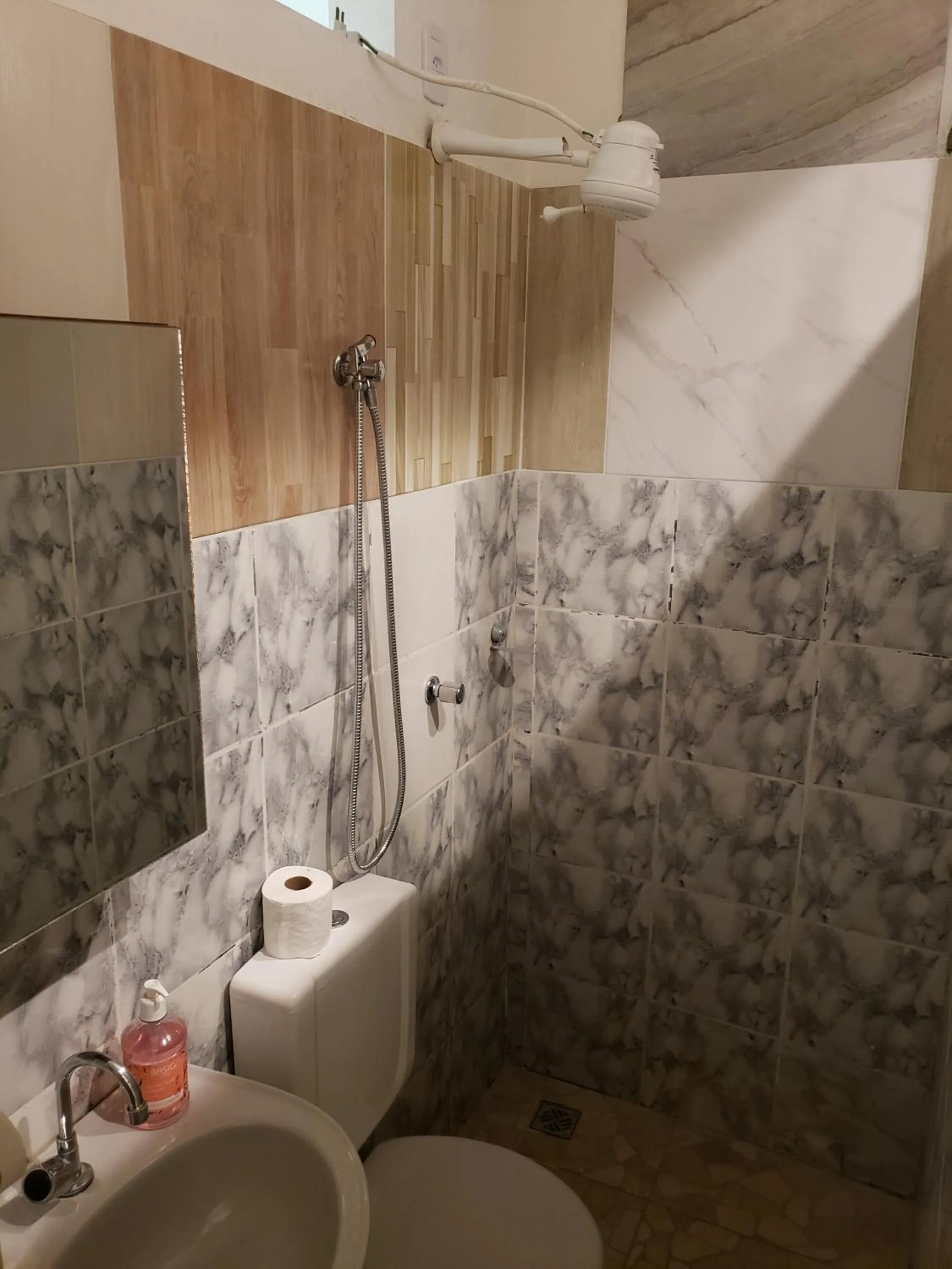 Bathroom in Kitnet Perto da Primeira Praia