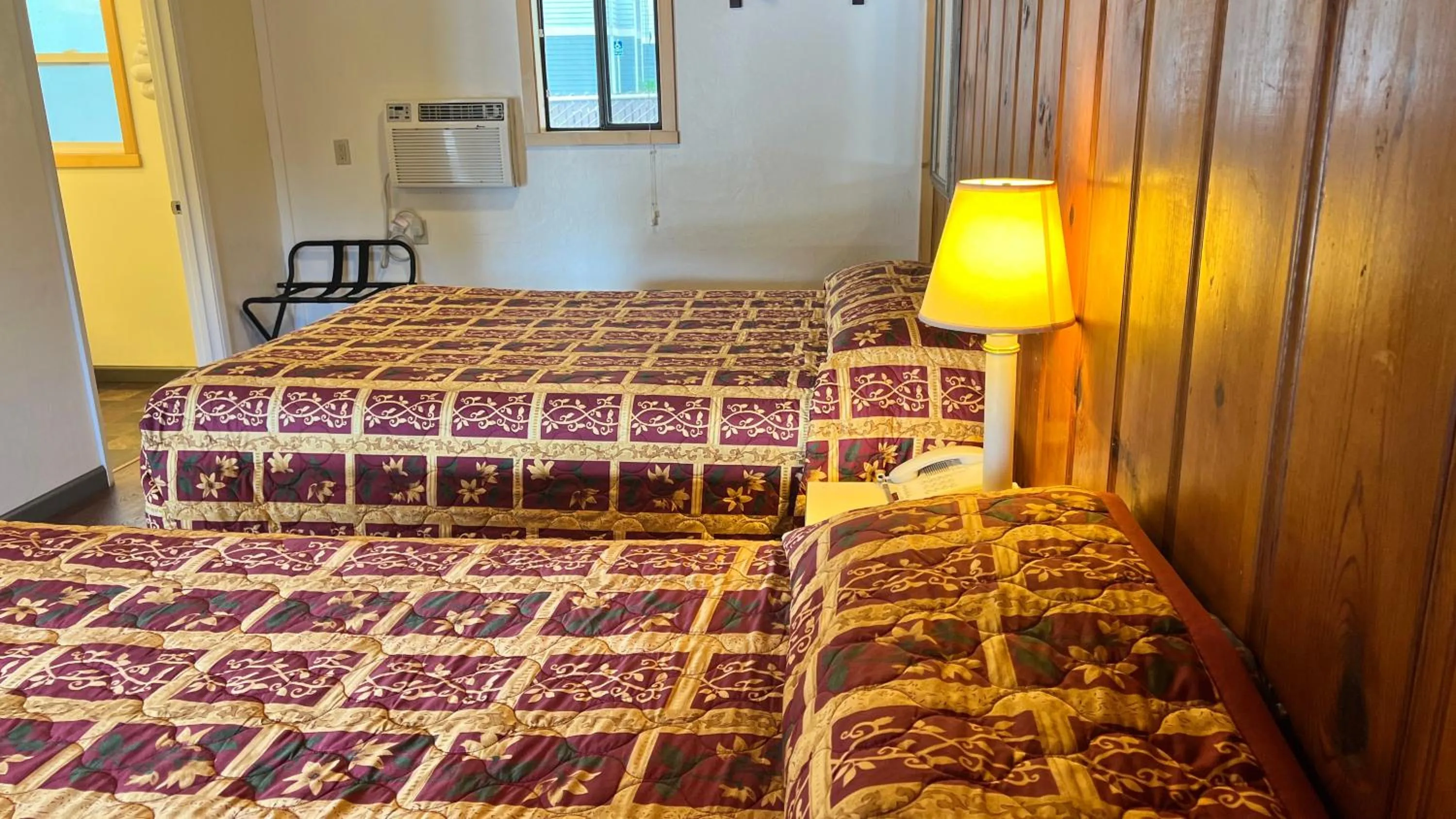 Bed in Pine Cone Motel