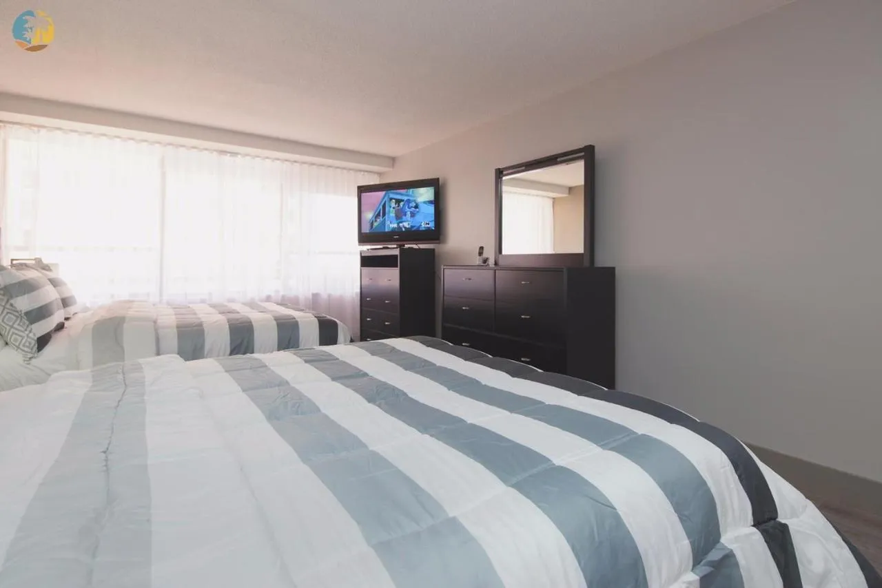 Bed in Deluxe Beach Resort - HORA RENTALS