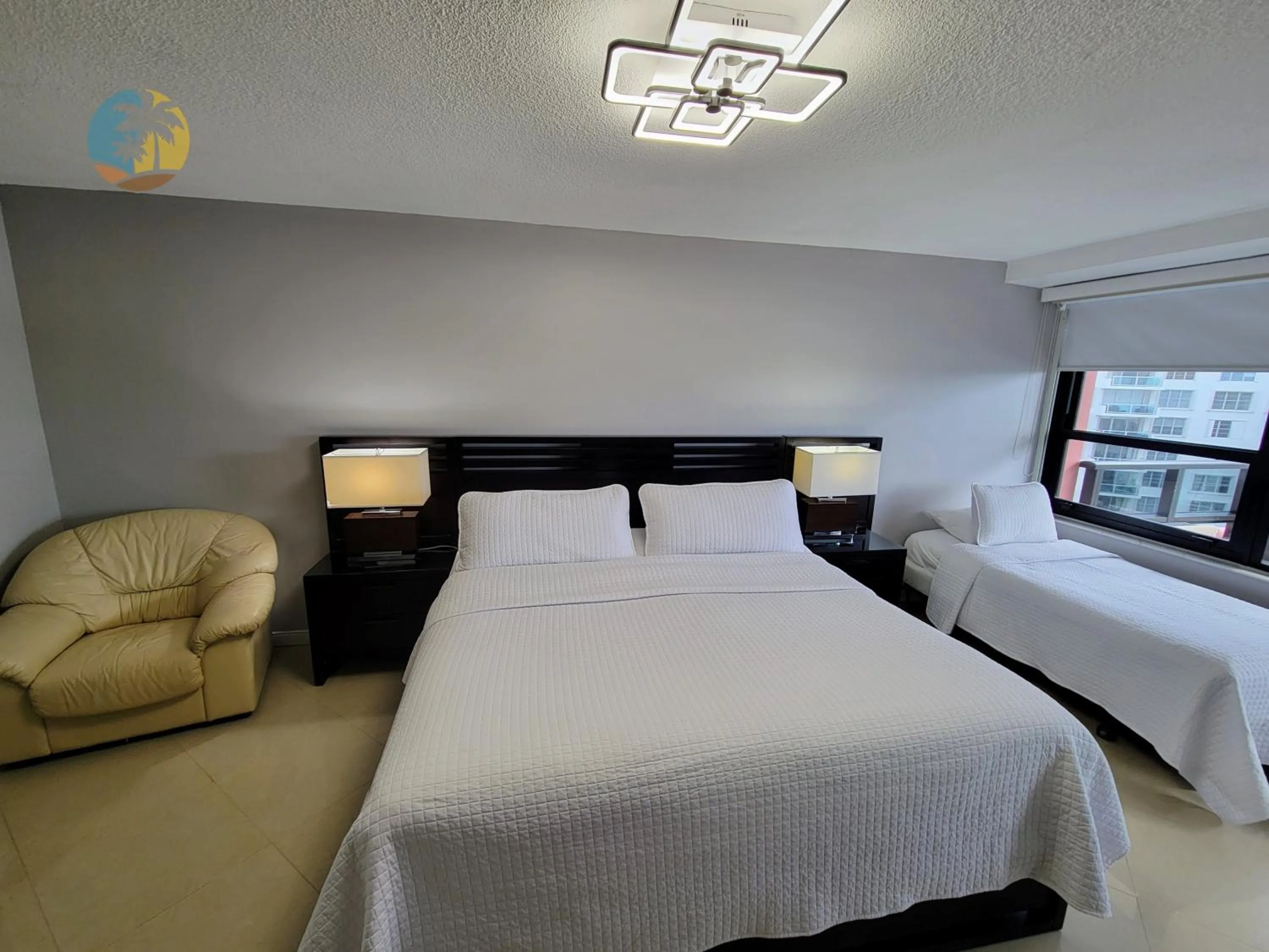 Bed in Deluxe Beach Resort - HORA RENTALS