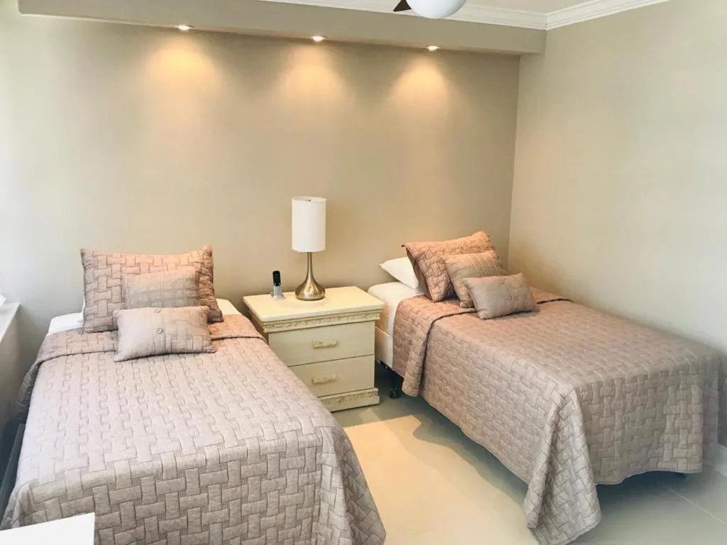 Bed in Deluxe Beach Resort - HORA RENTALS