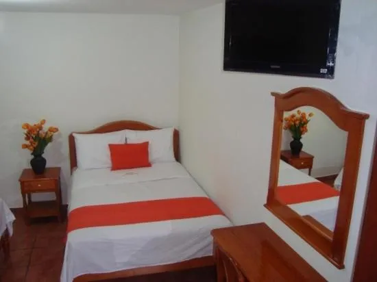 Bed in Hotel La Cascada Oaxaca