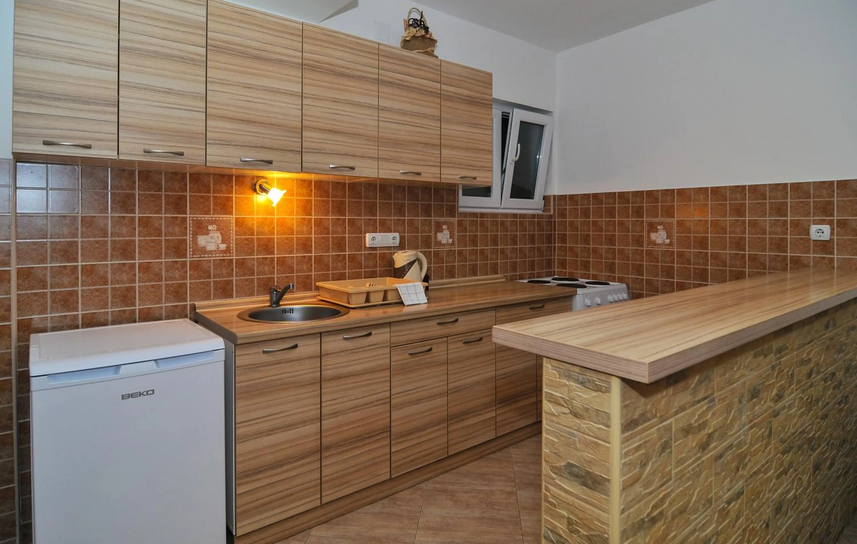 Kitchen or kitchenette in Apartments Samardžić