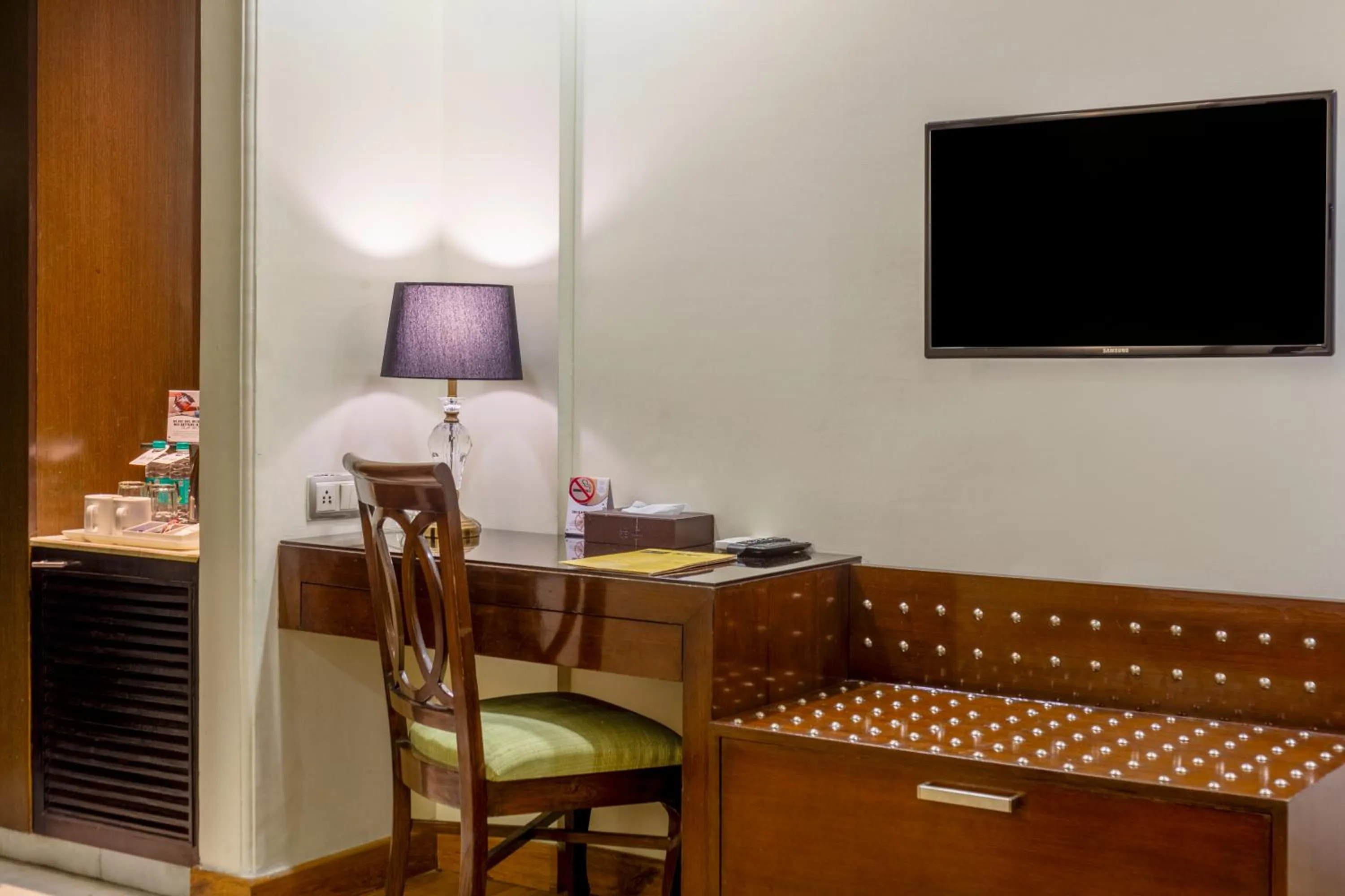 Bed in The Grand Orion - Kailash Colony