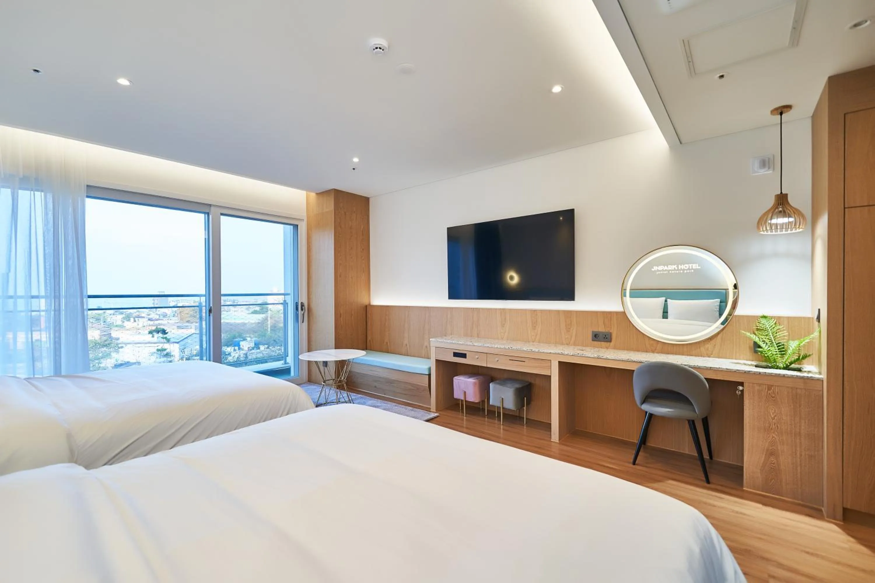 Bed in JN PARK Hotel