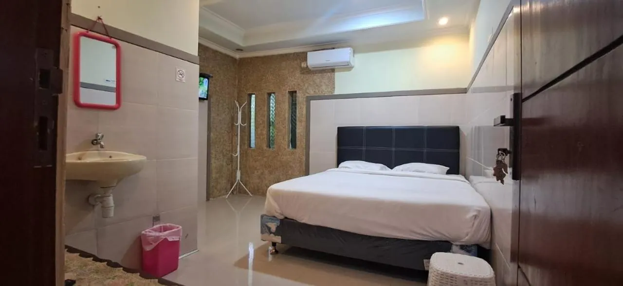 Bed in CALDERA PARK HOMESTAY Syariah