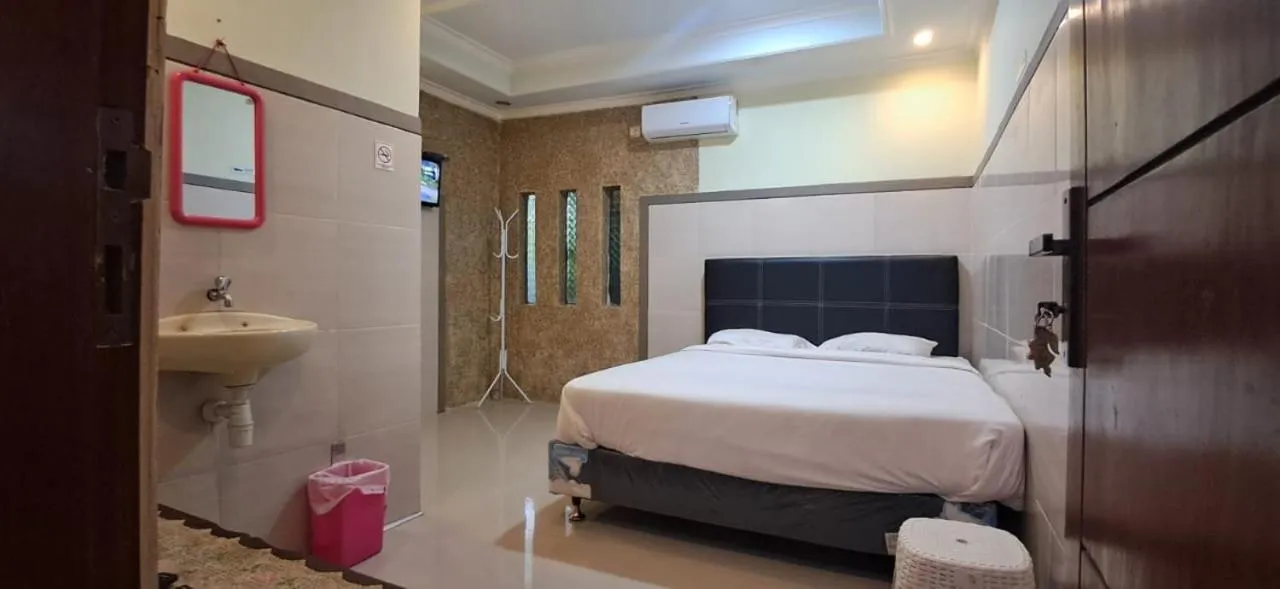 Bed in CALDERA PARK HOMESTAY Syariah