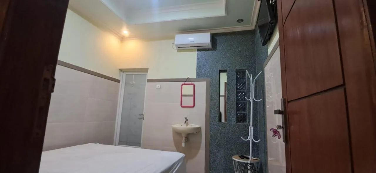 Bed in CALDERA PARK HOMESTAY Syariah