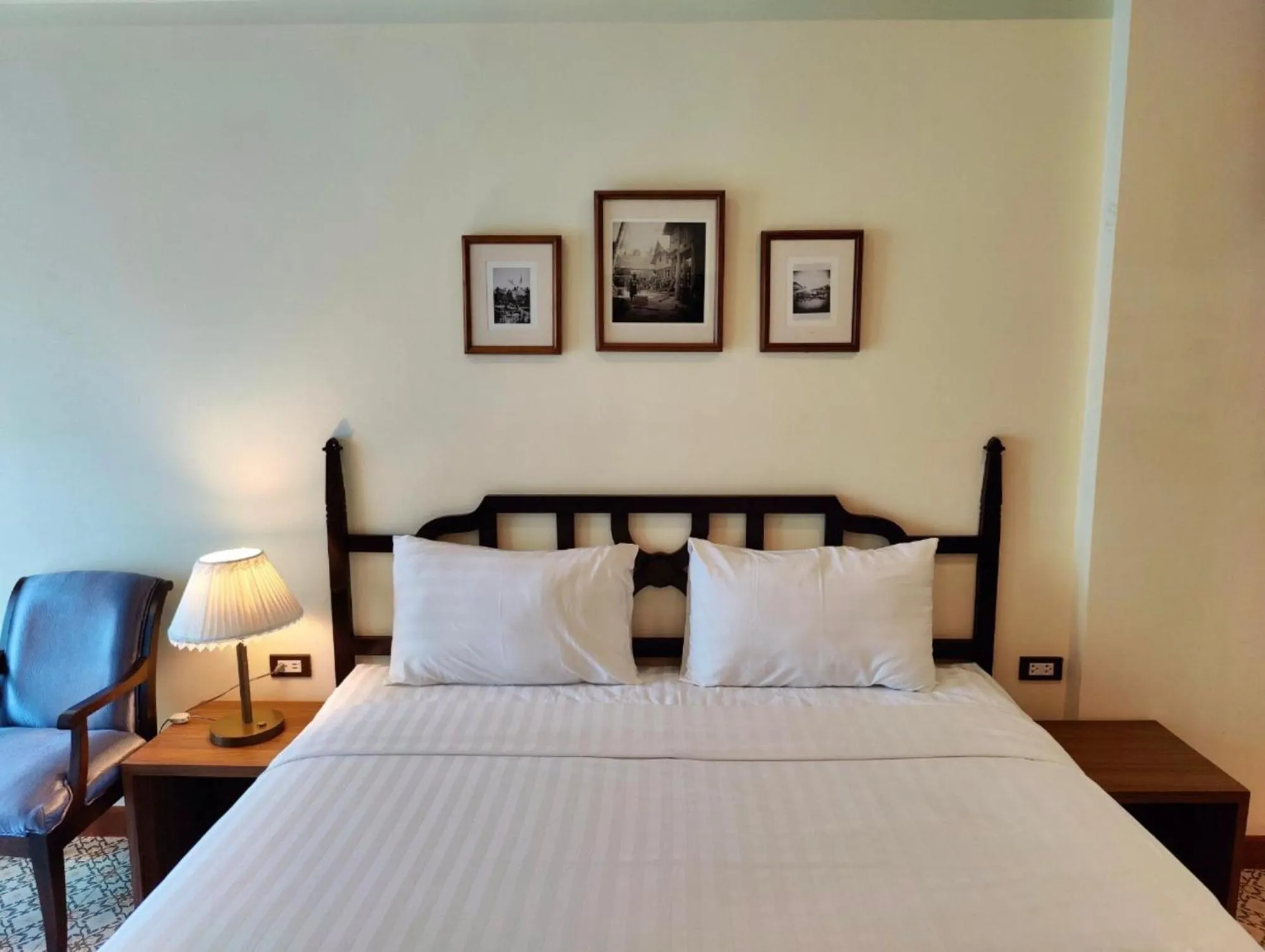 Bed in Baan Chao Khun Hotel