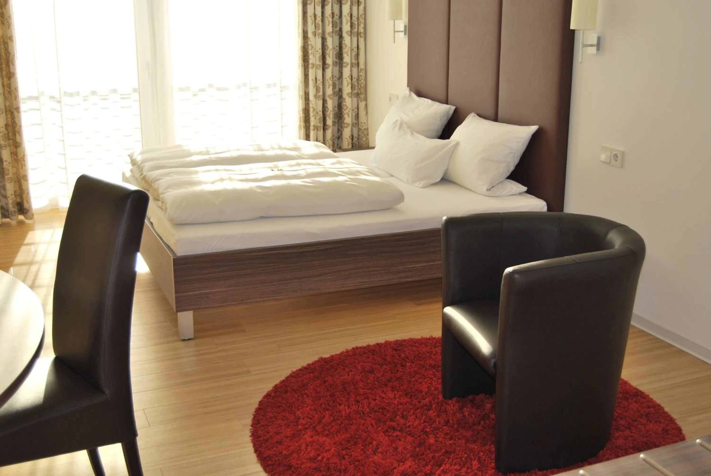 Photo of the whole room, Bed in Das Quartier