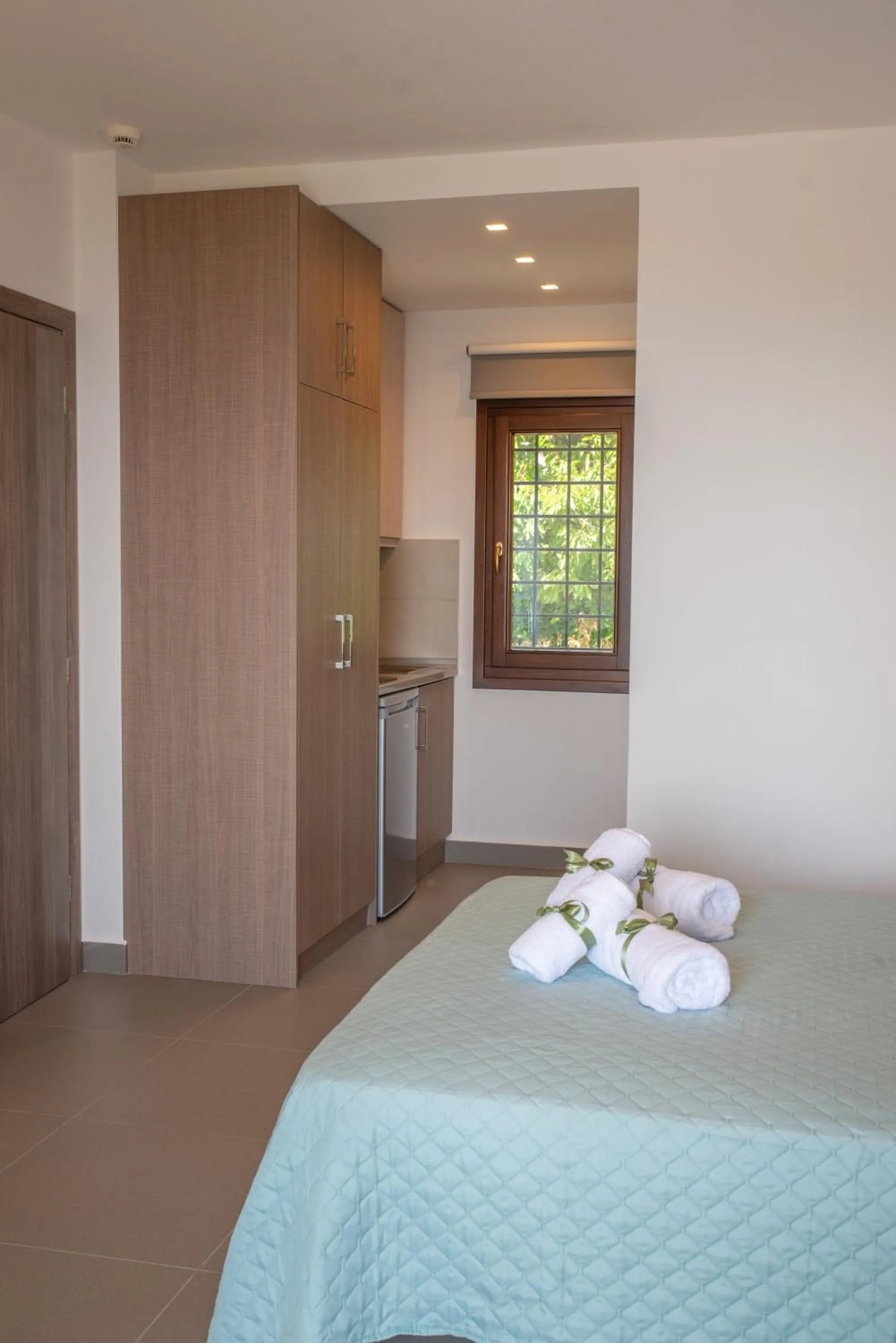 Bed in Aelia Mount Suites