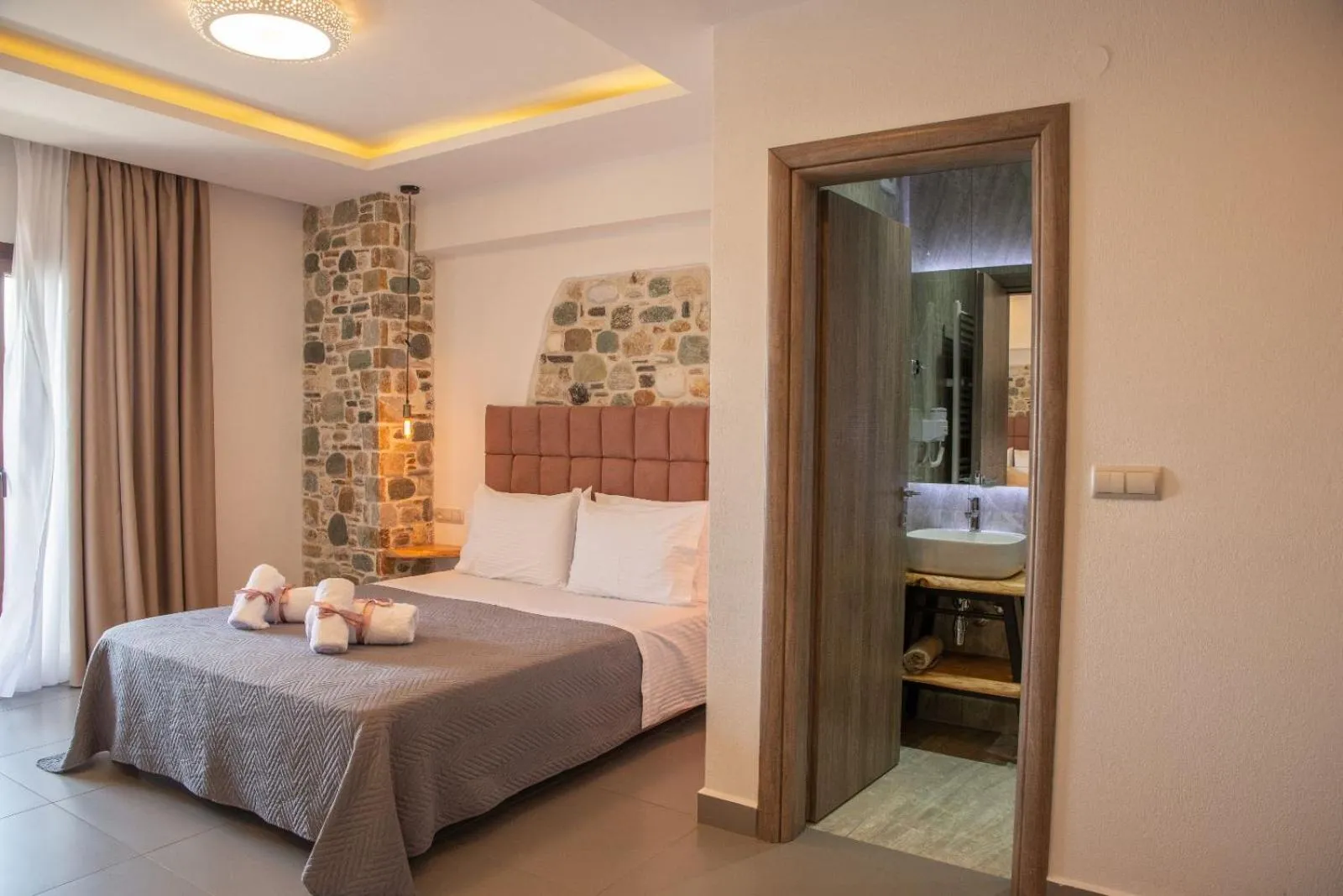 Bed in Aelia Mount Suites