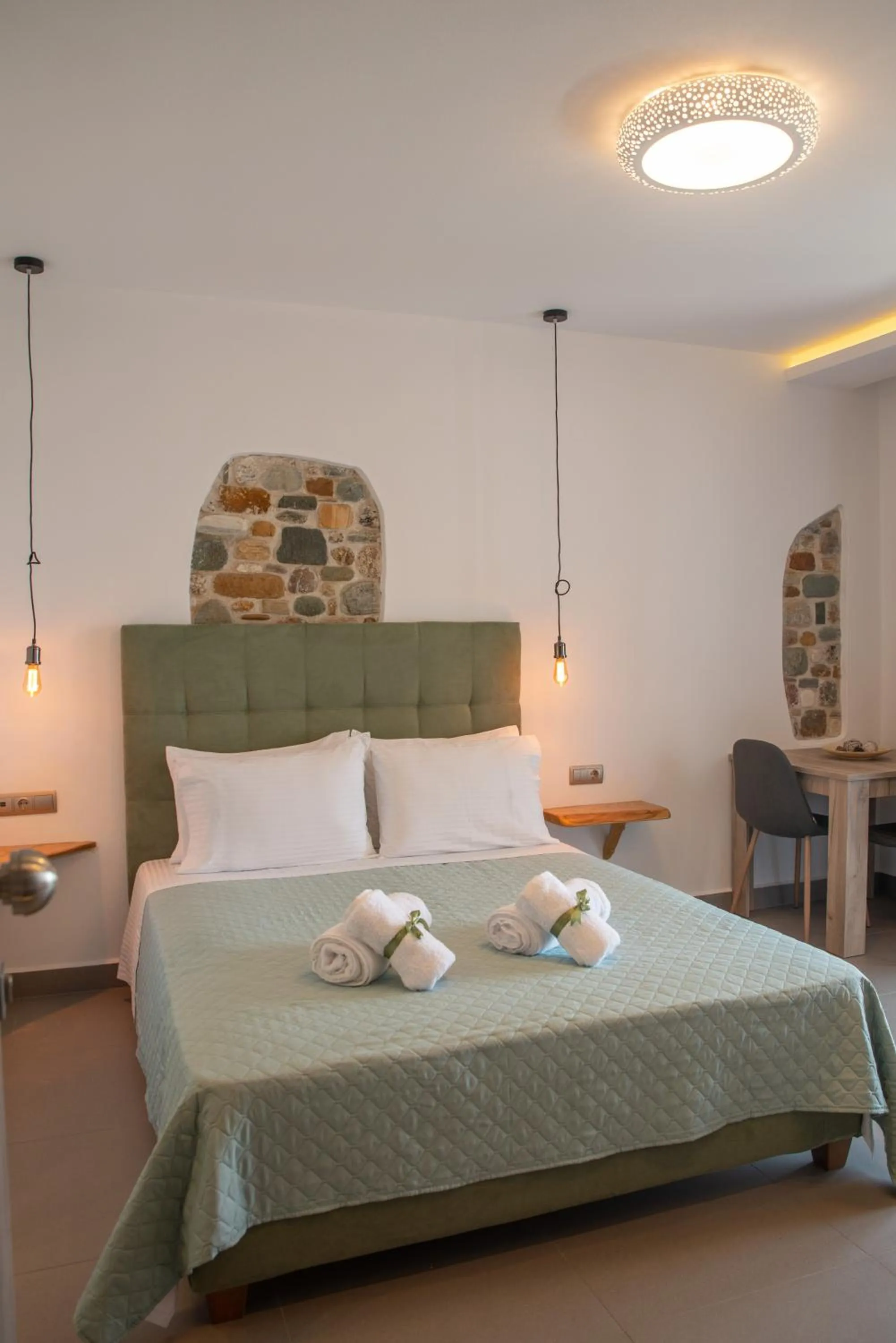 Bed in Aelia Mount Suites