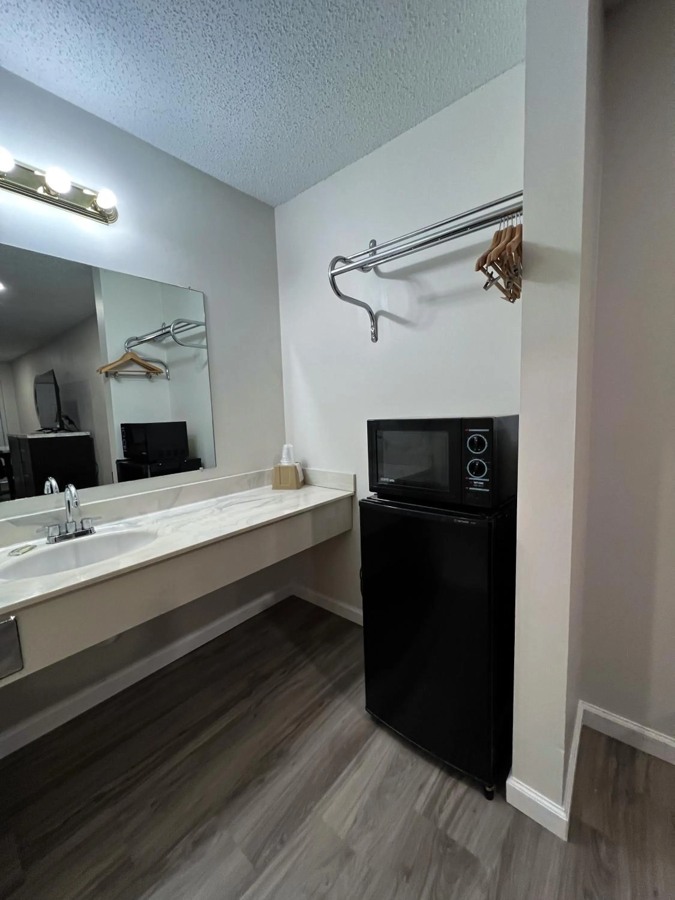 Bathroom in Garden Inn & Suites