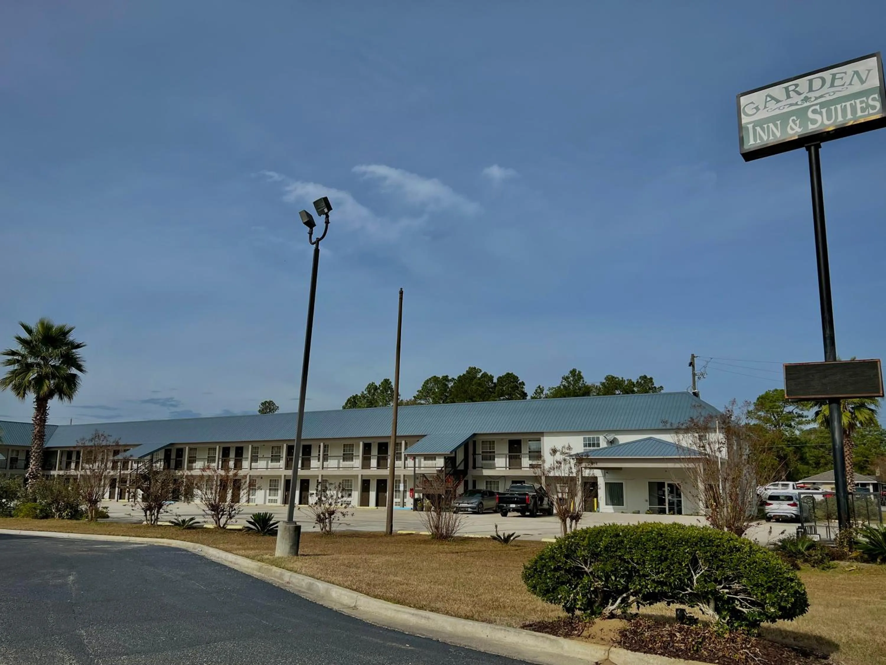 Property building in Garden Inn & Suites