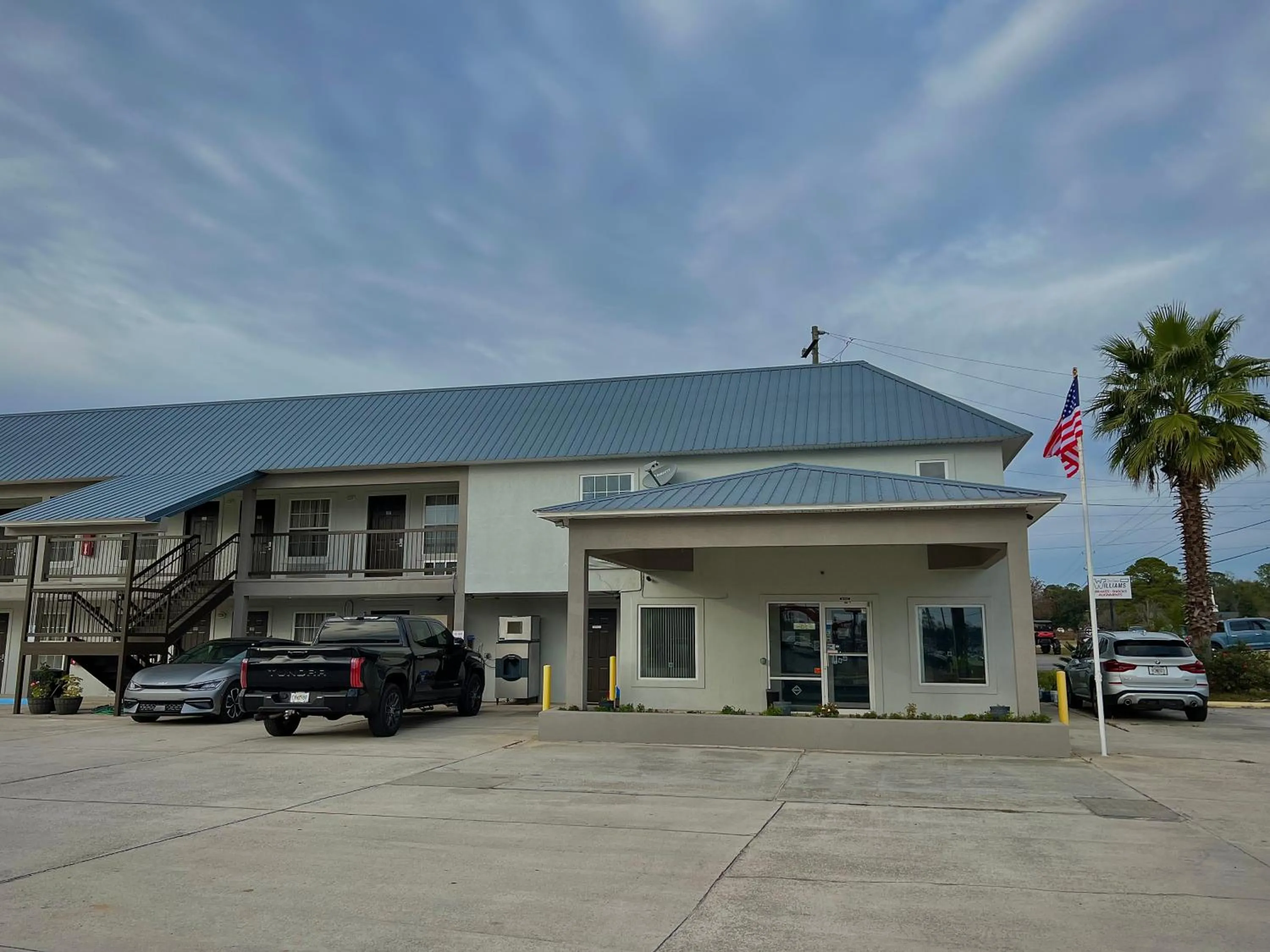 Property building in Garden Inn & Suites