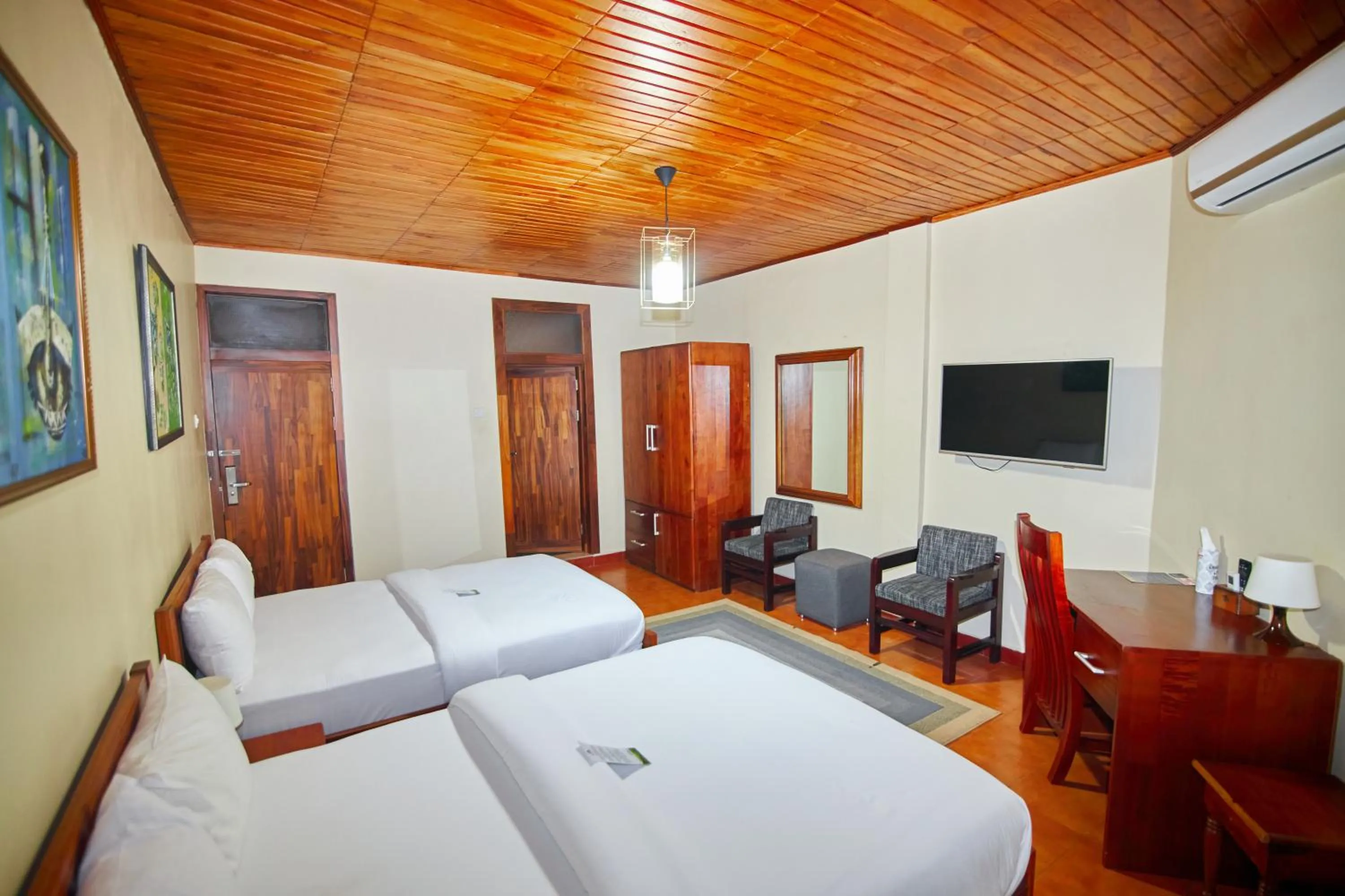 Bed in The Haven Boutique Hotel